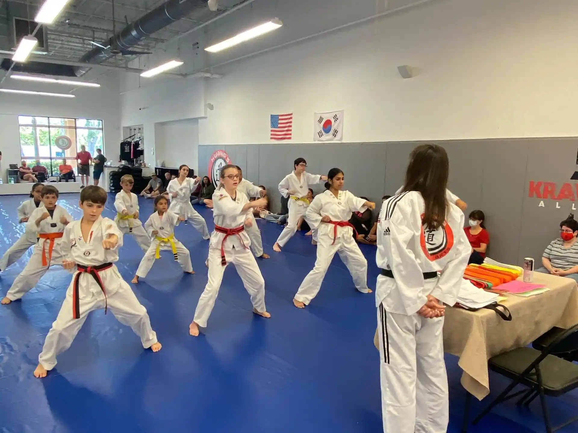 a group of people in karate uniforms