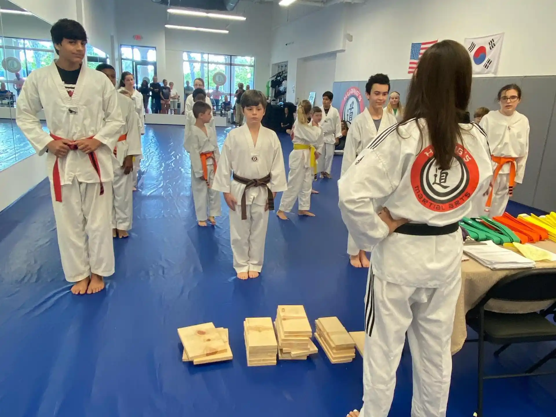 a group of people in white lab coats in a room