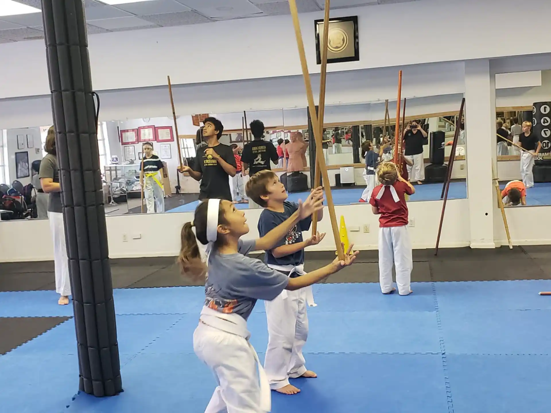 a group of people practicing martial arts