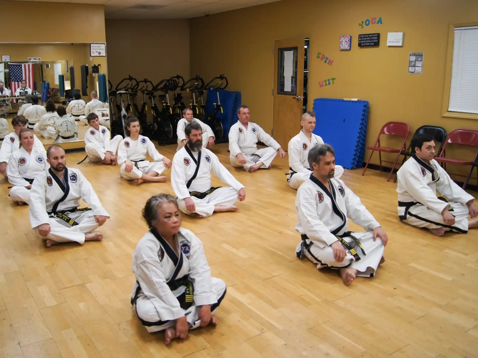 a group of people sitting on the floor