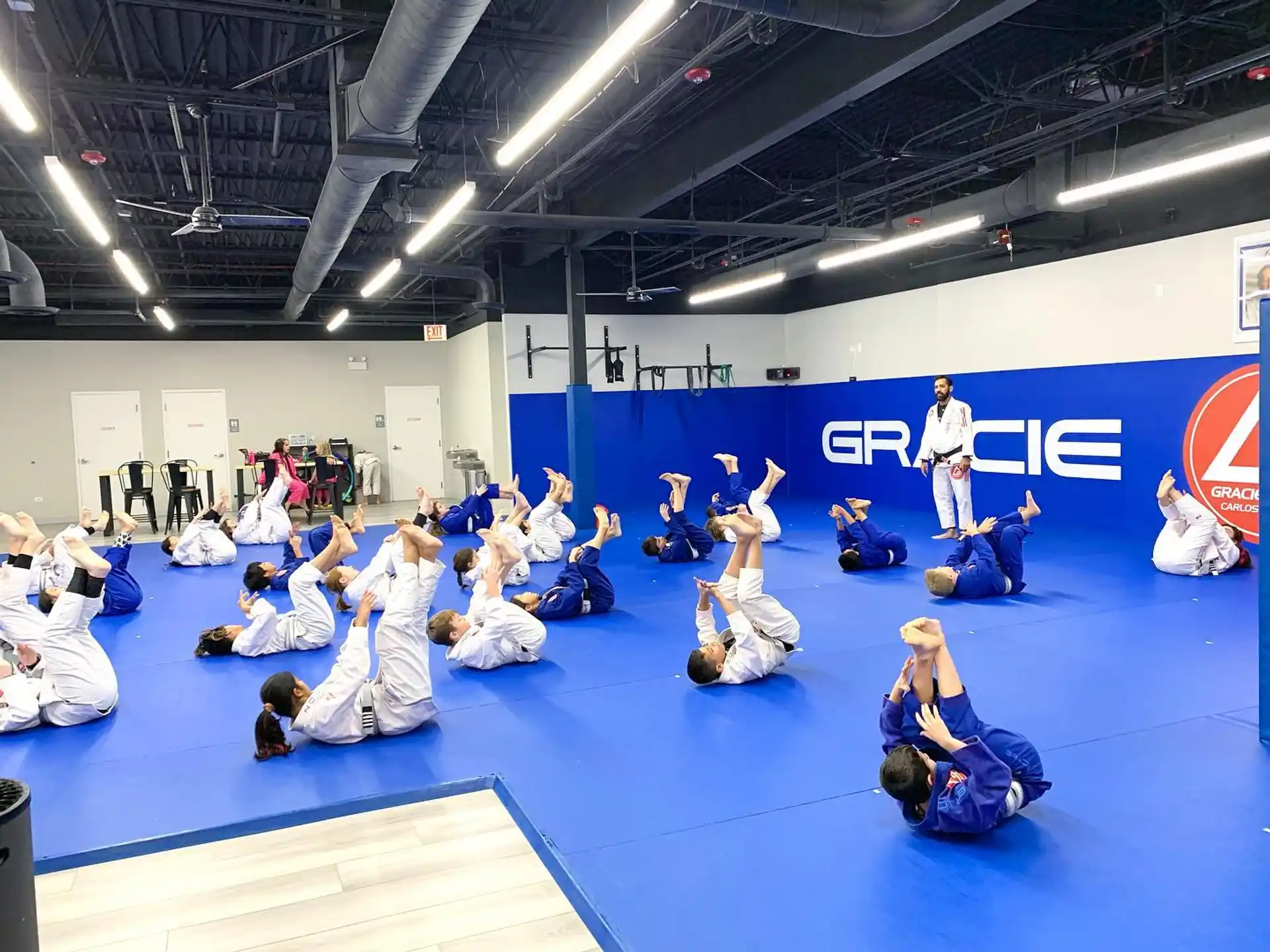 a group of people in a karate class