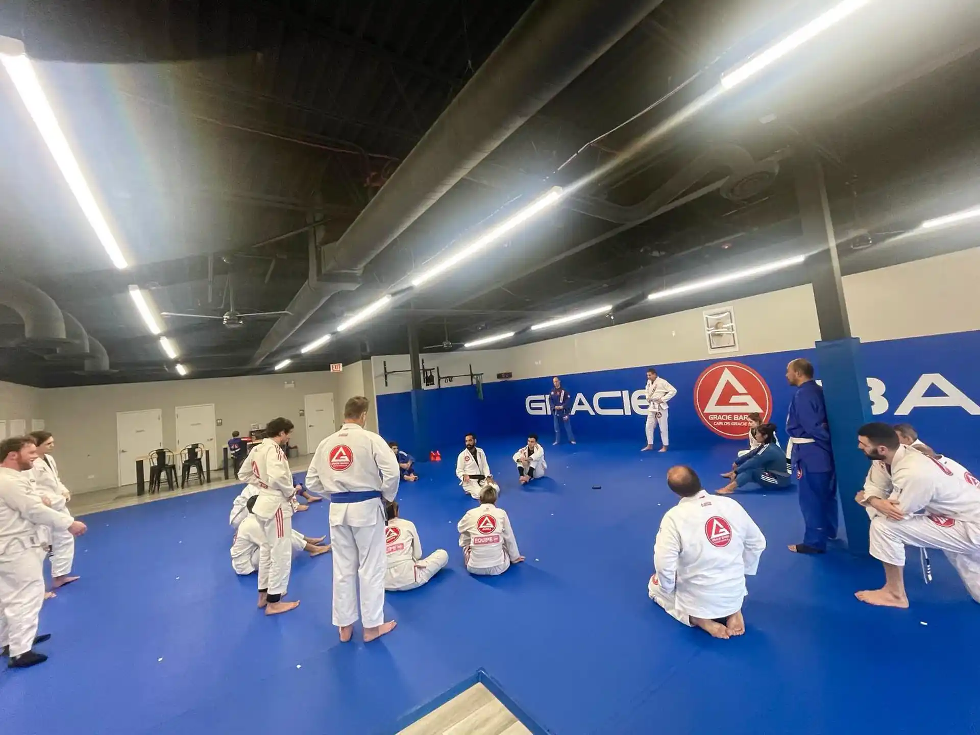 a group of people in karate uniforms