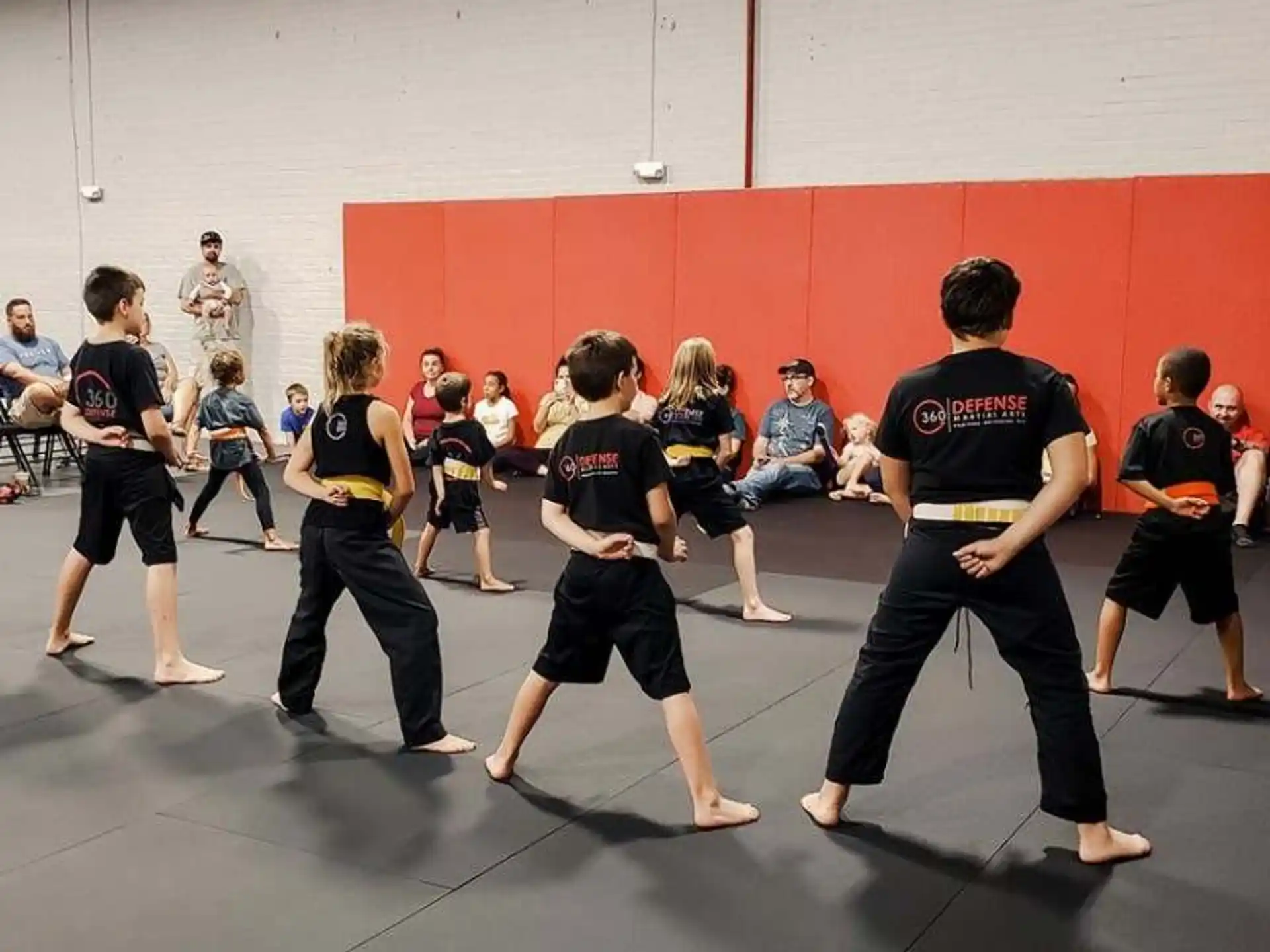 a group of people in a gym