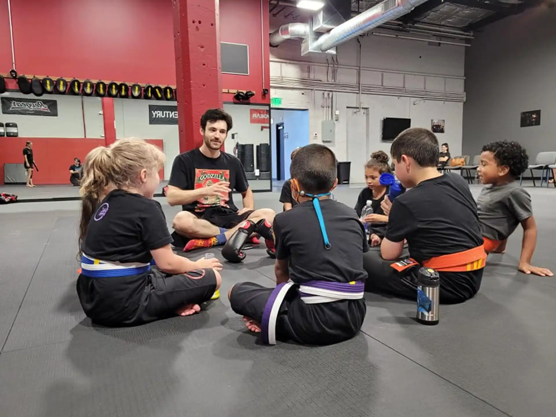 a group of people sitting on the floor
