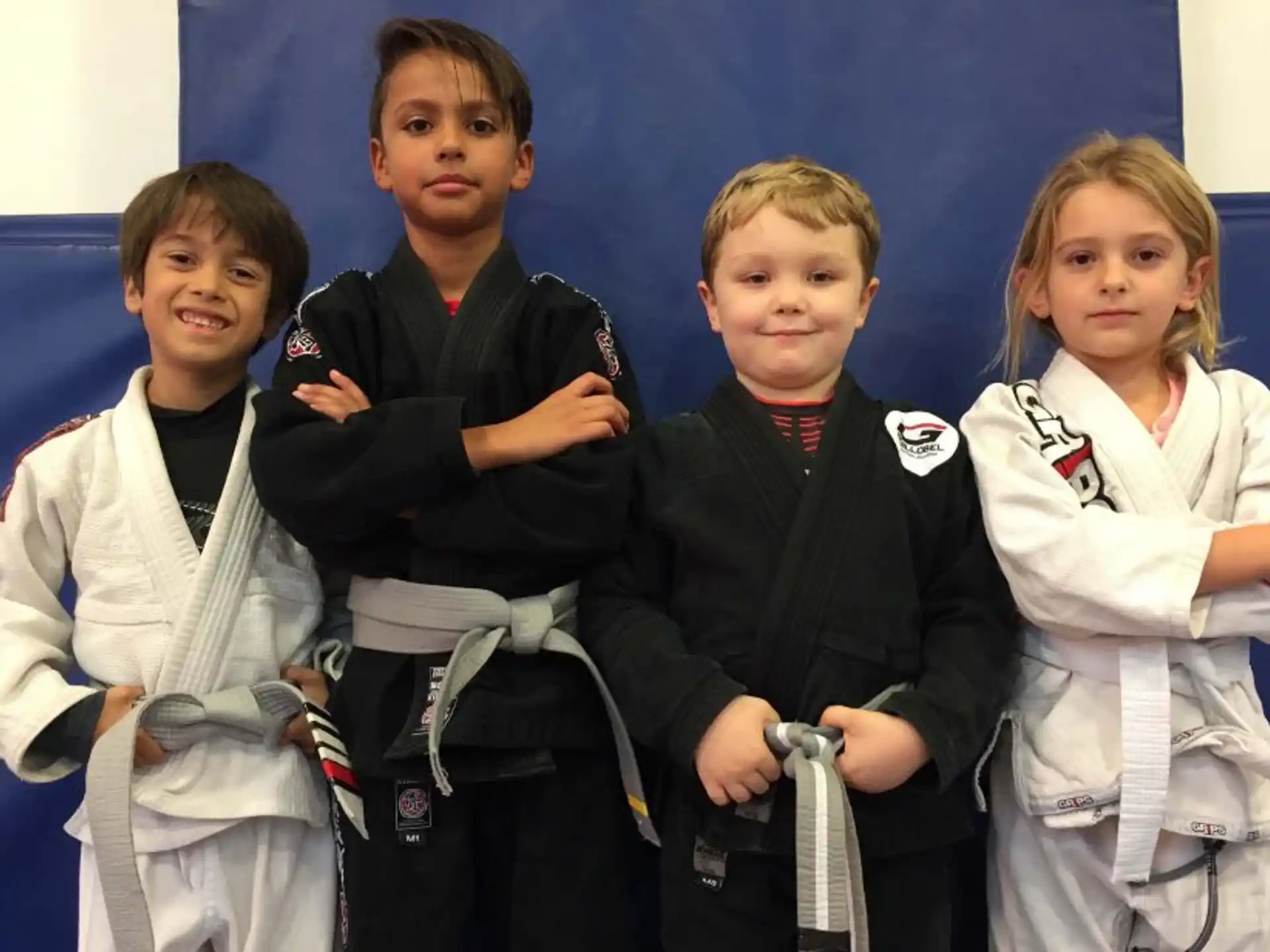 a group of kids posing for a photo