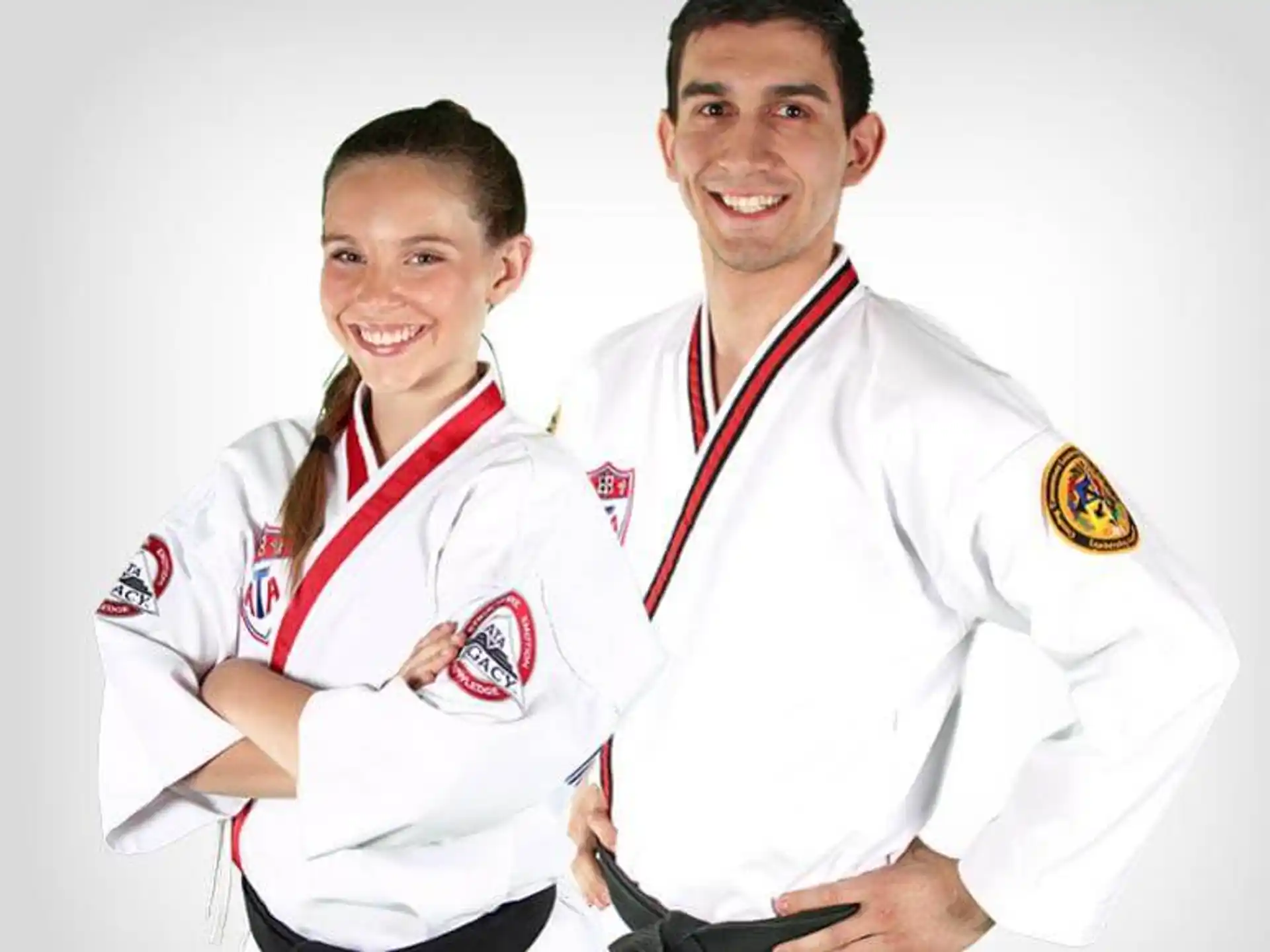 a man and a woman wearing medals