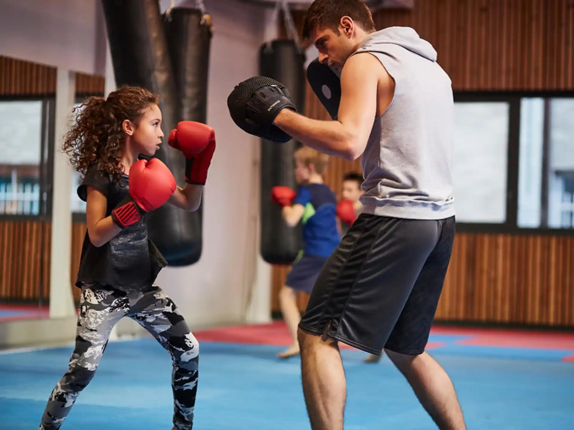 a man and a woman boxing