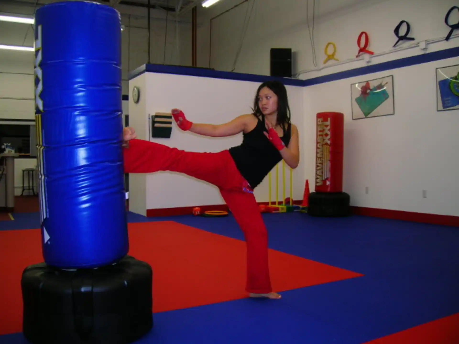 a person posing in a gym