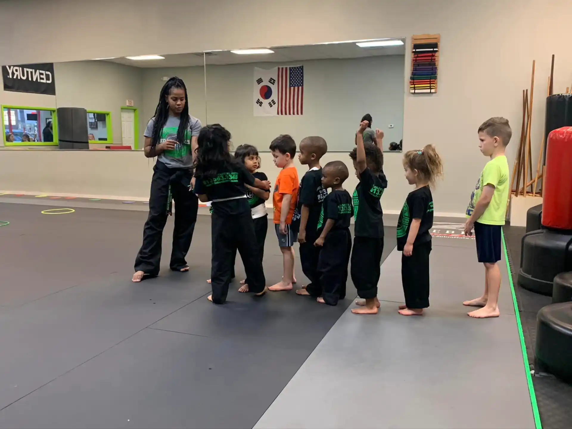 a group of children standing in a room