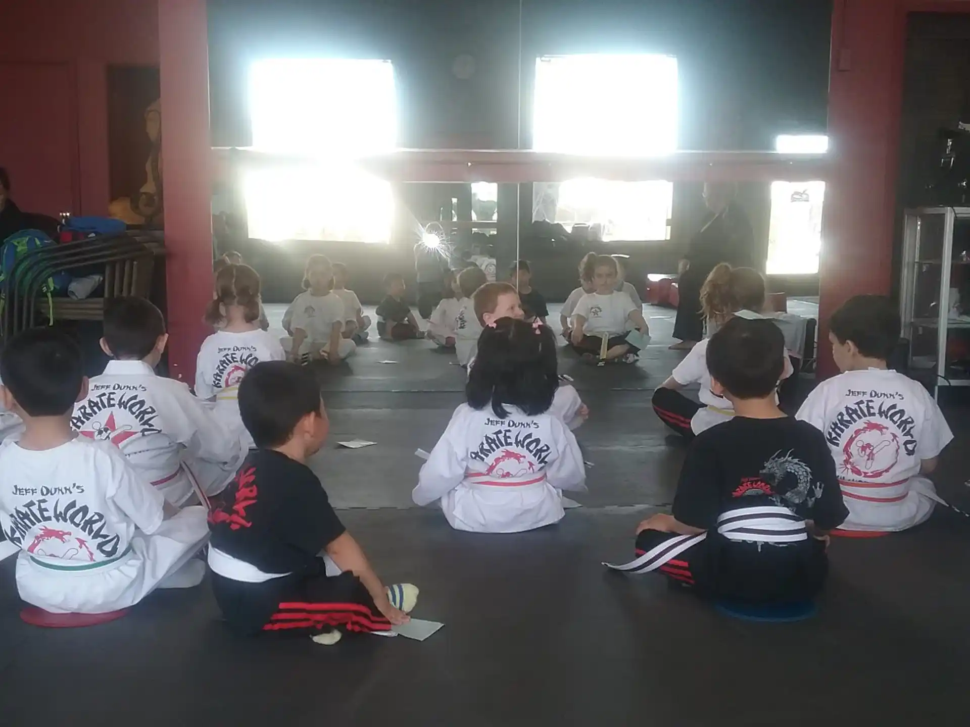 a group of people sitting on the floor