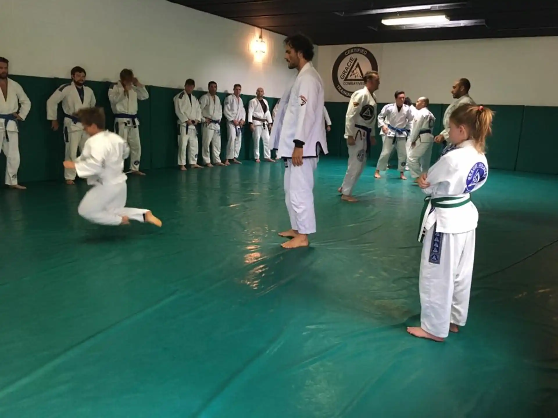 a group of people in karate uniforms