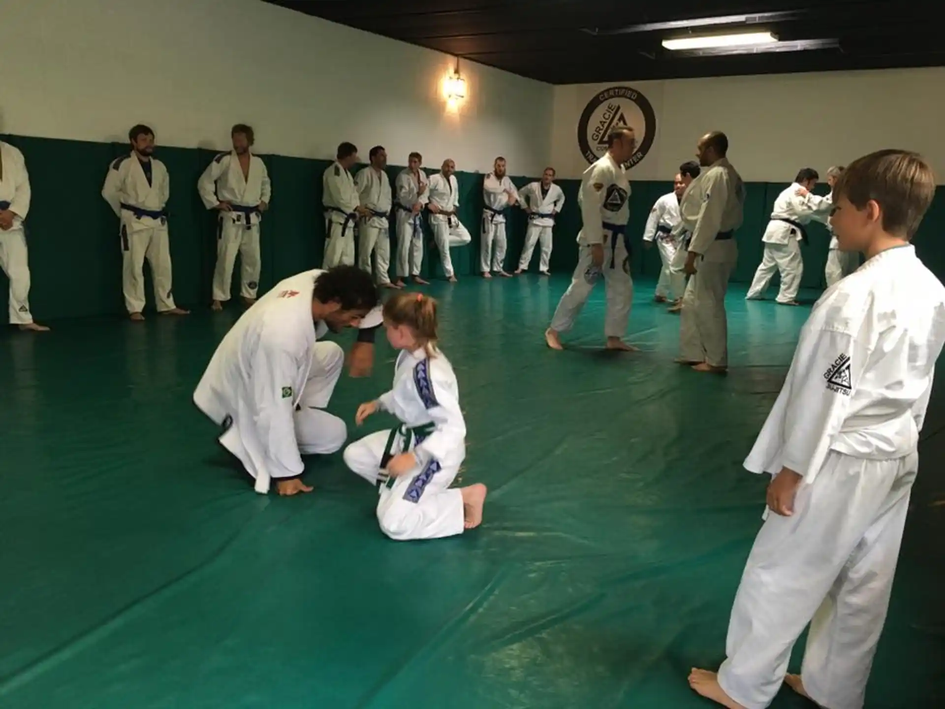a group of people in karate uniforms