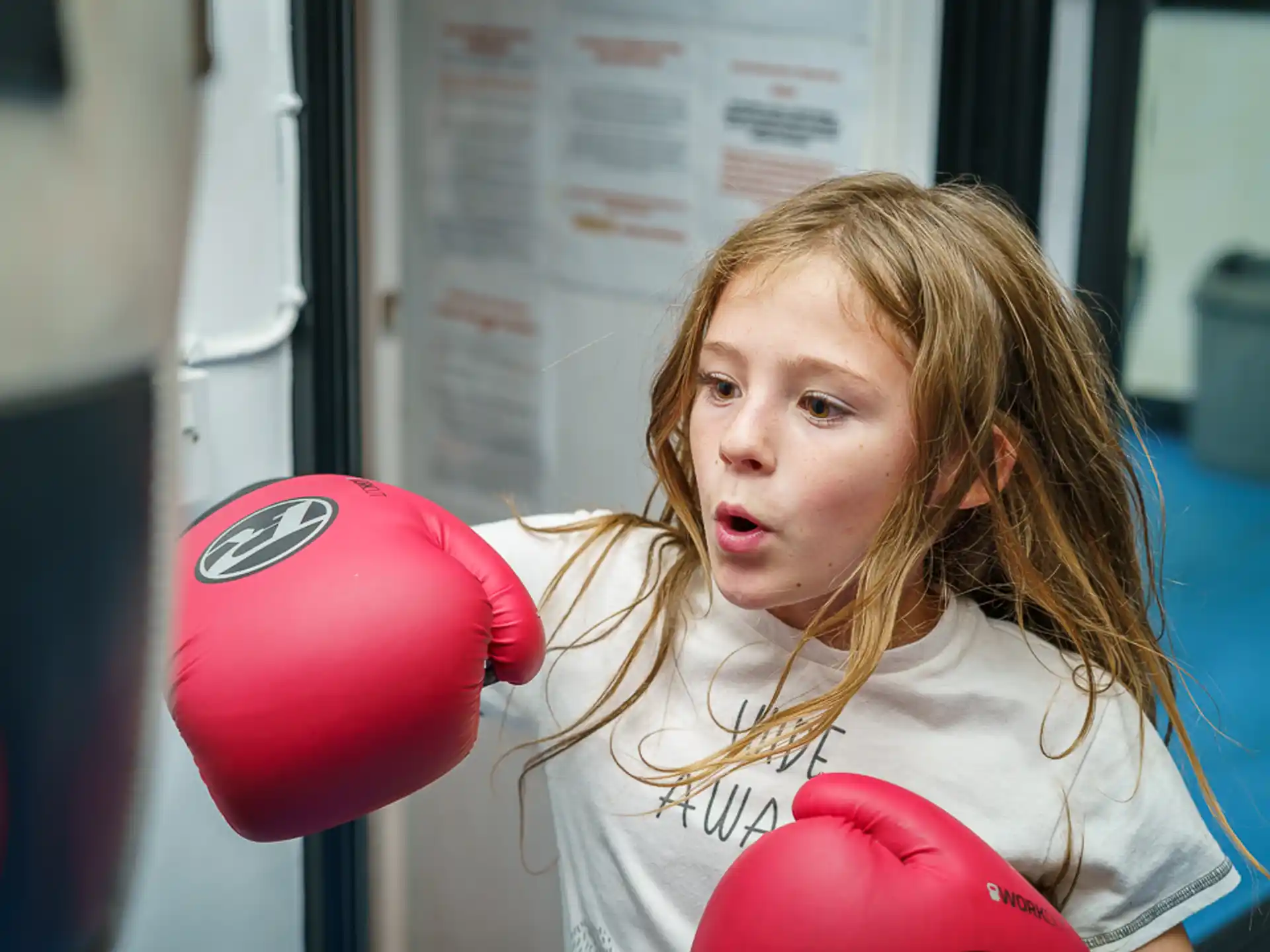 a person holding a boxing glove