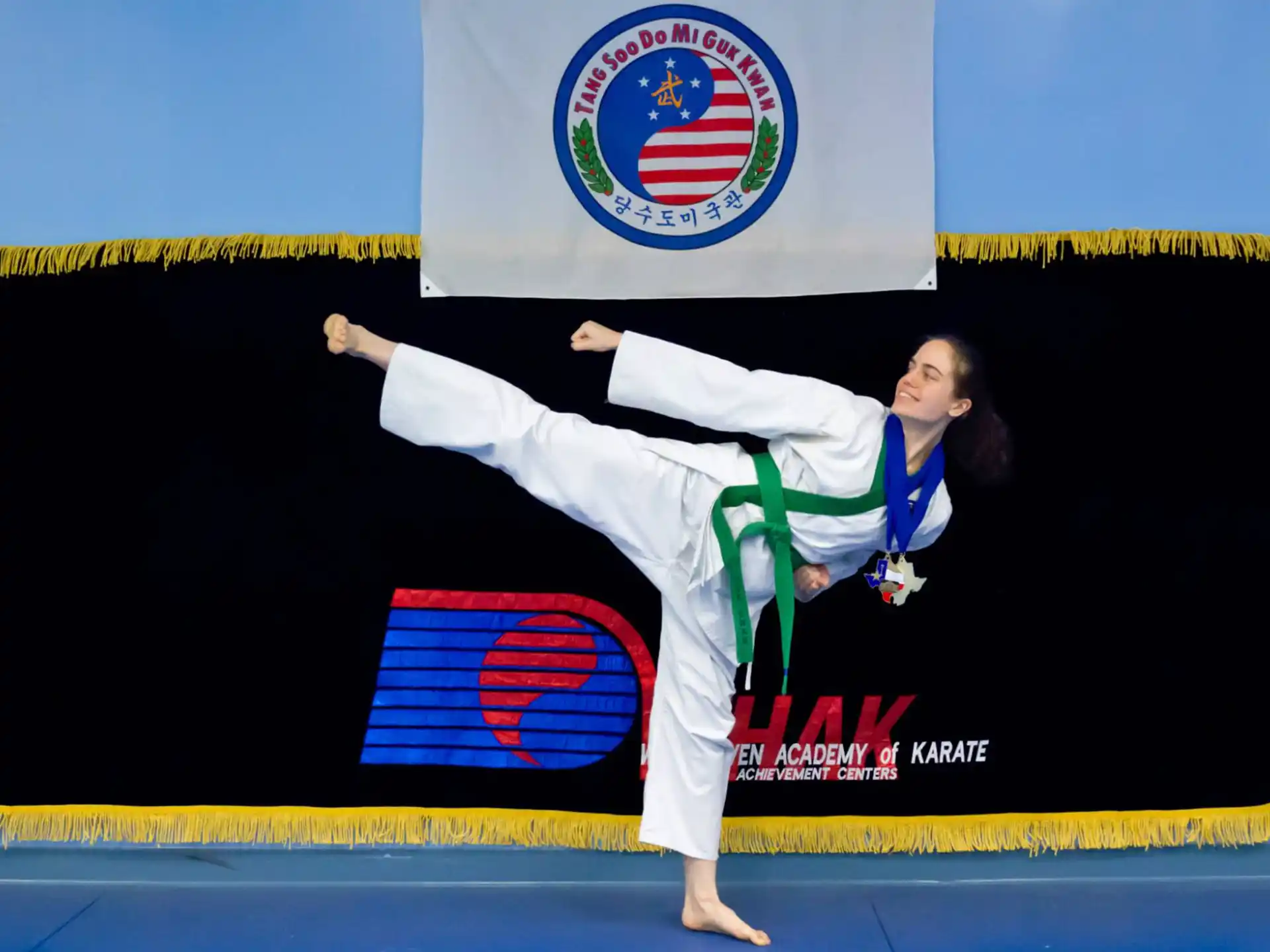 a man in a karate uniform