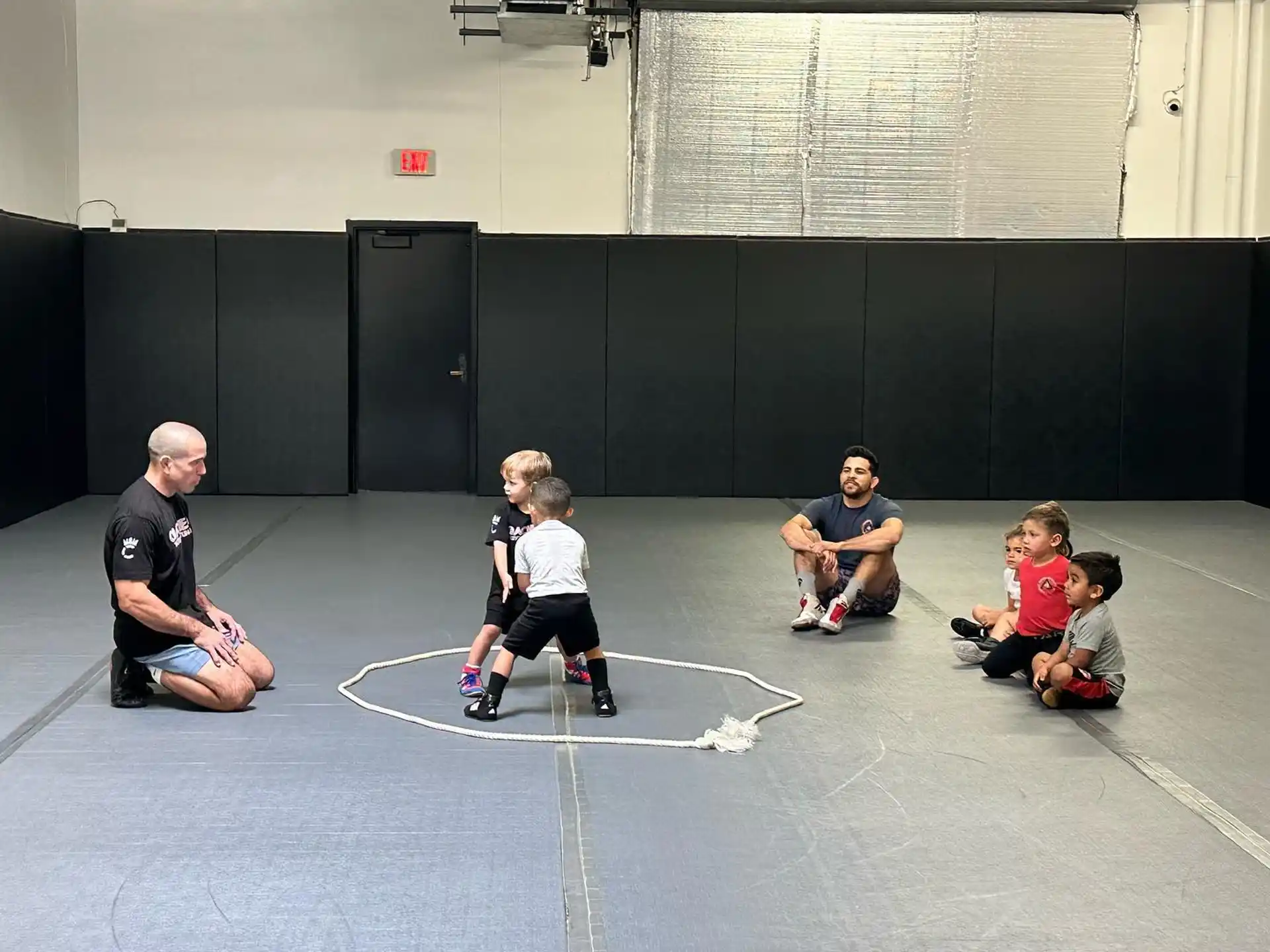 a group of people sitting on the floor