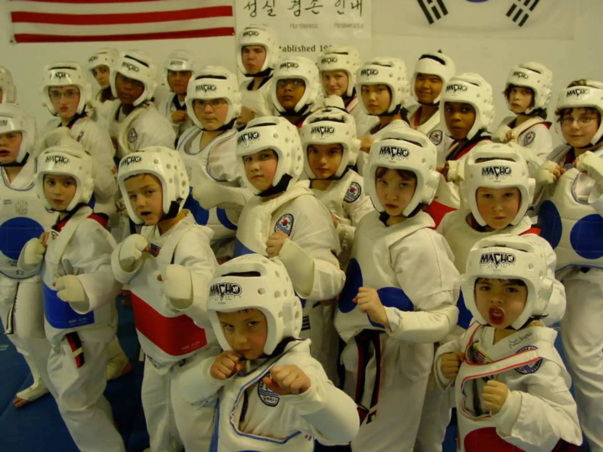 a group of people wearing white helmets