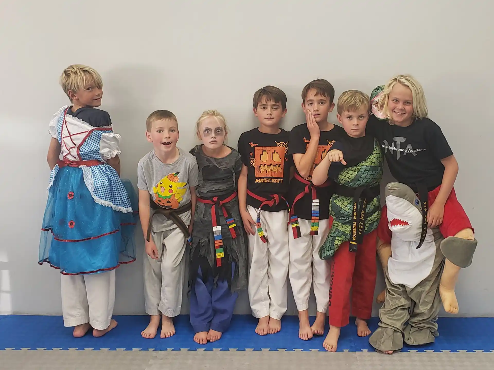 a group of children posing for a photo