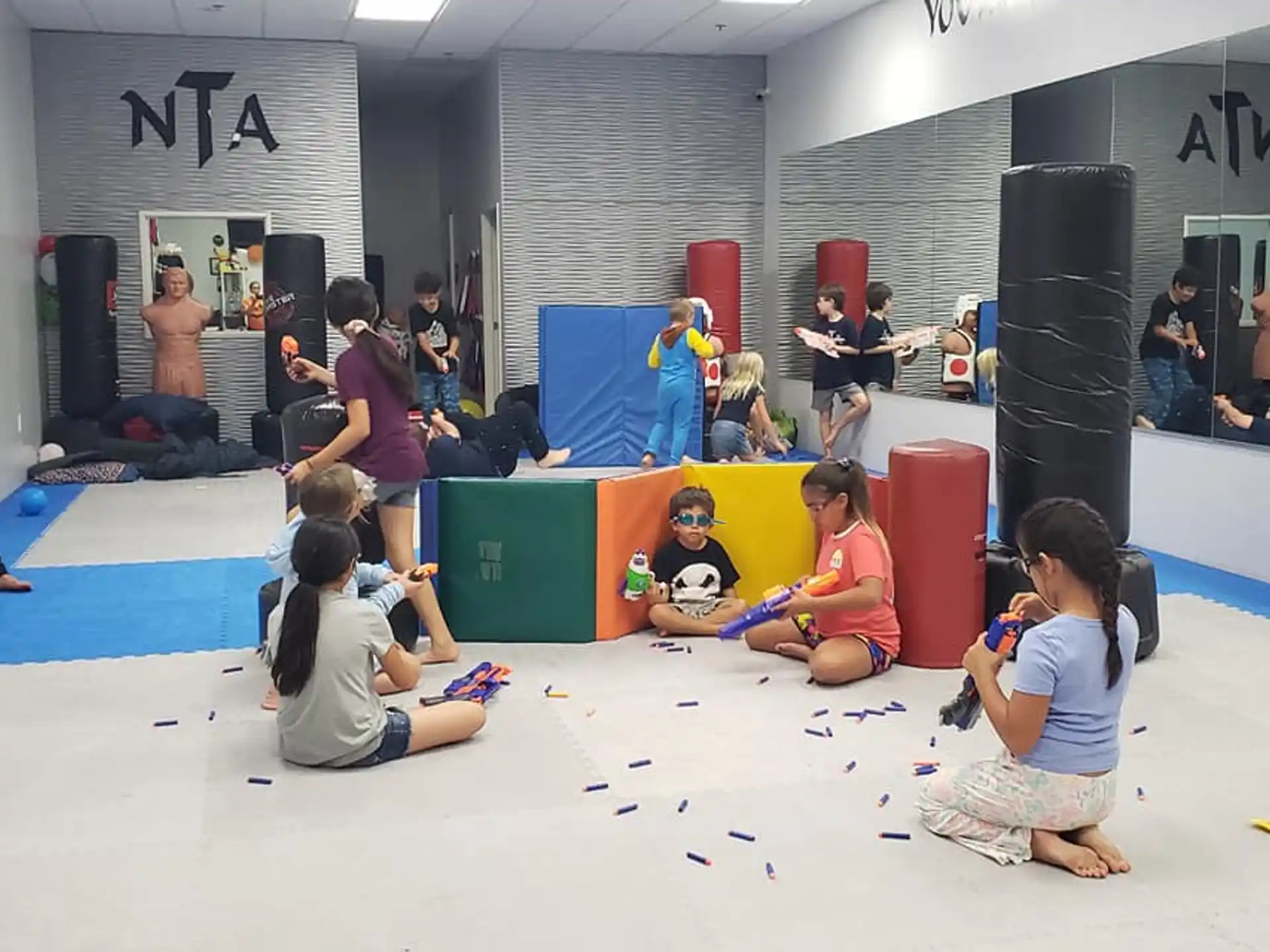 a group of people sitting on the floor