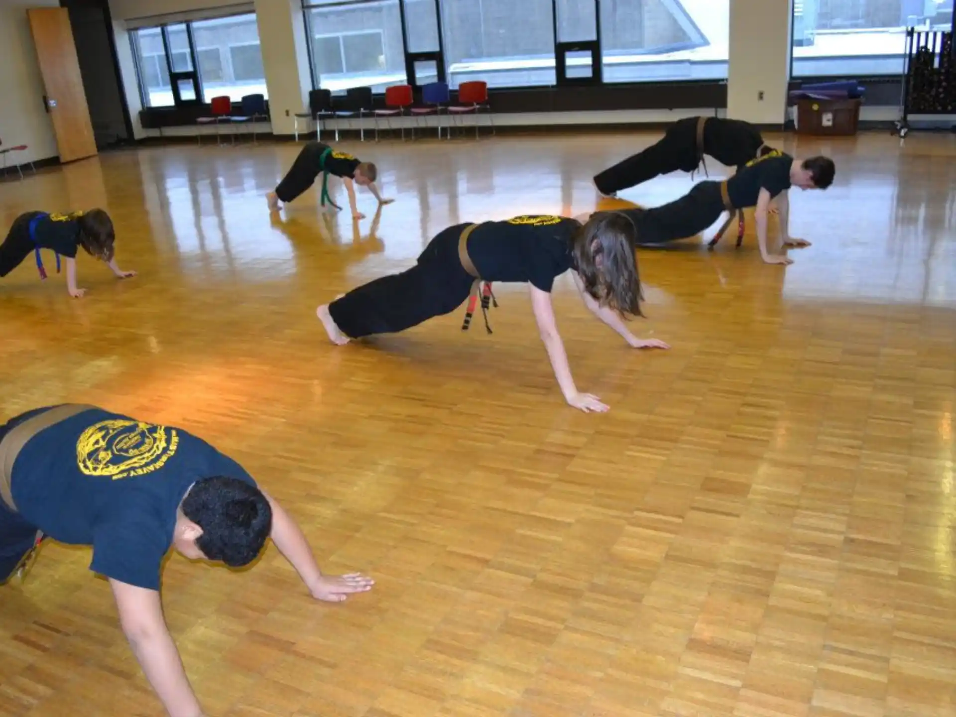 a group of people doing yoga
