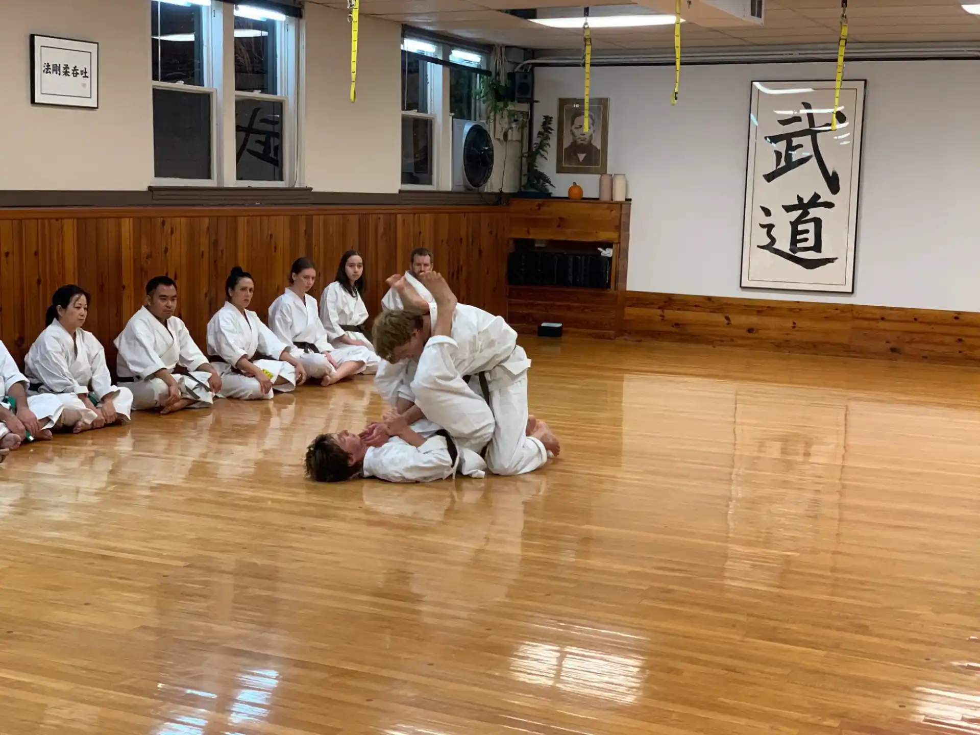 a group of people sitting on the floor