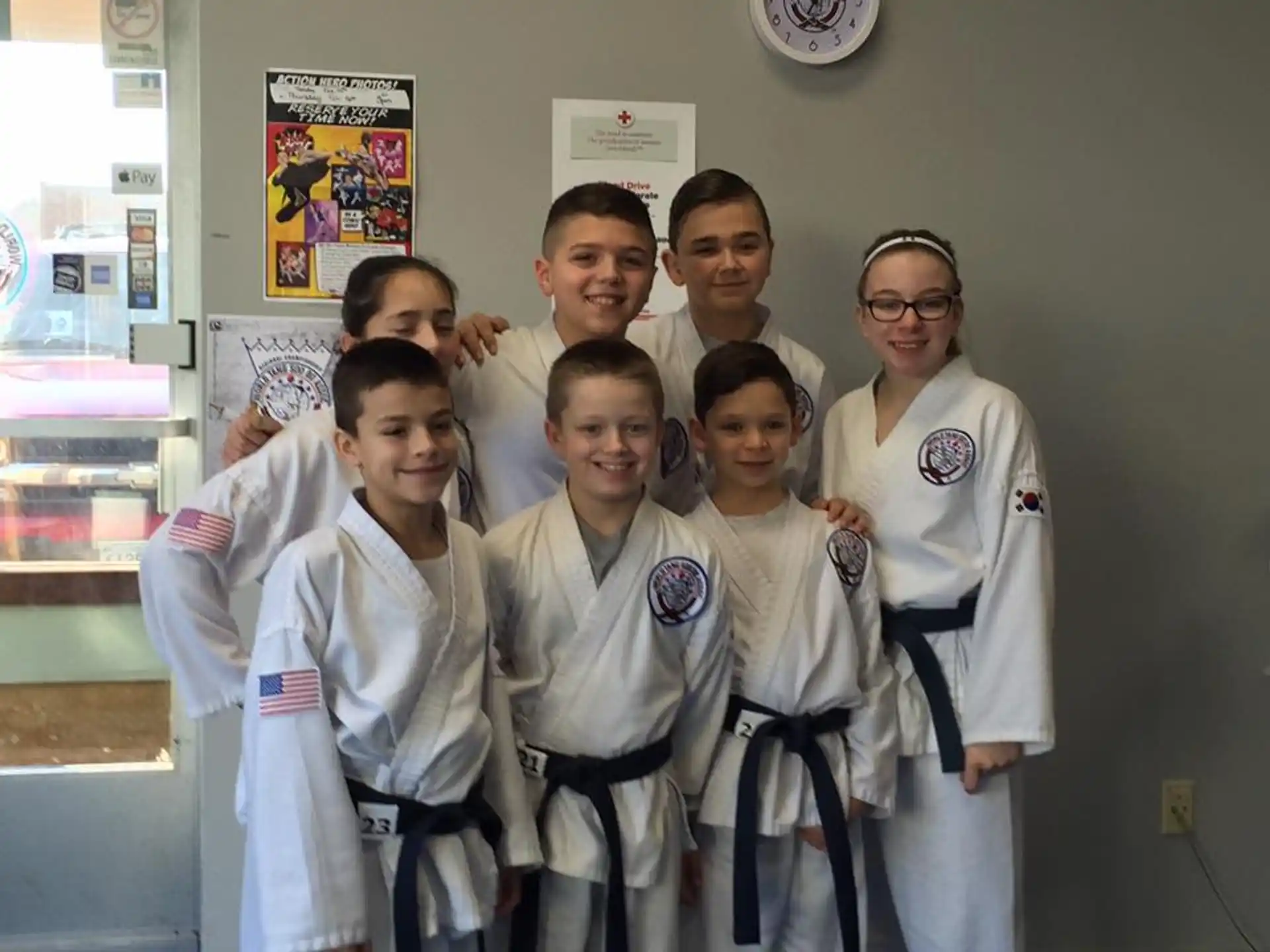 a group of people in white lab coats