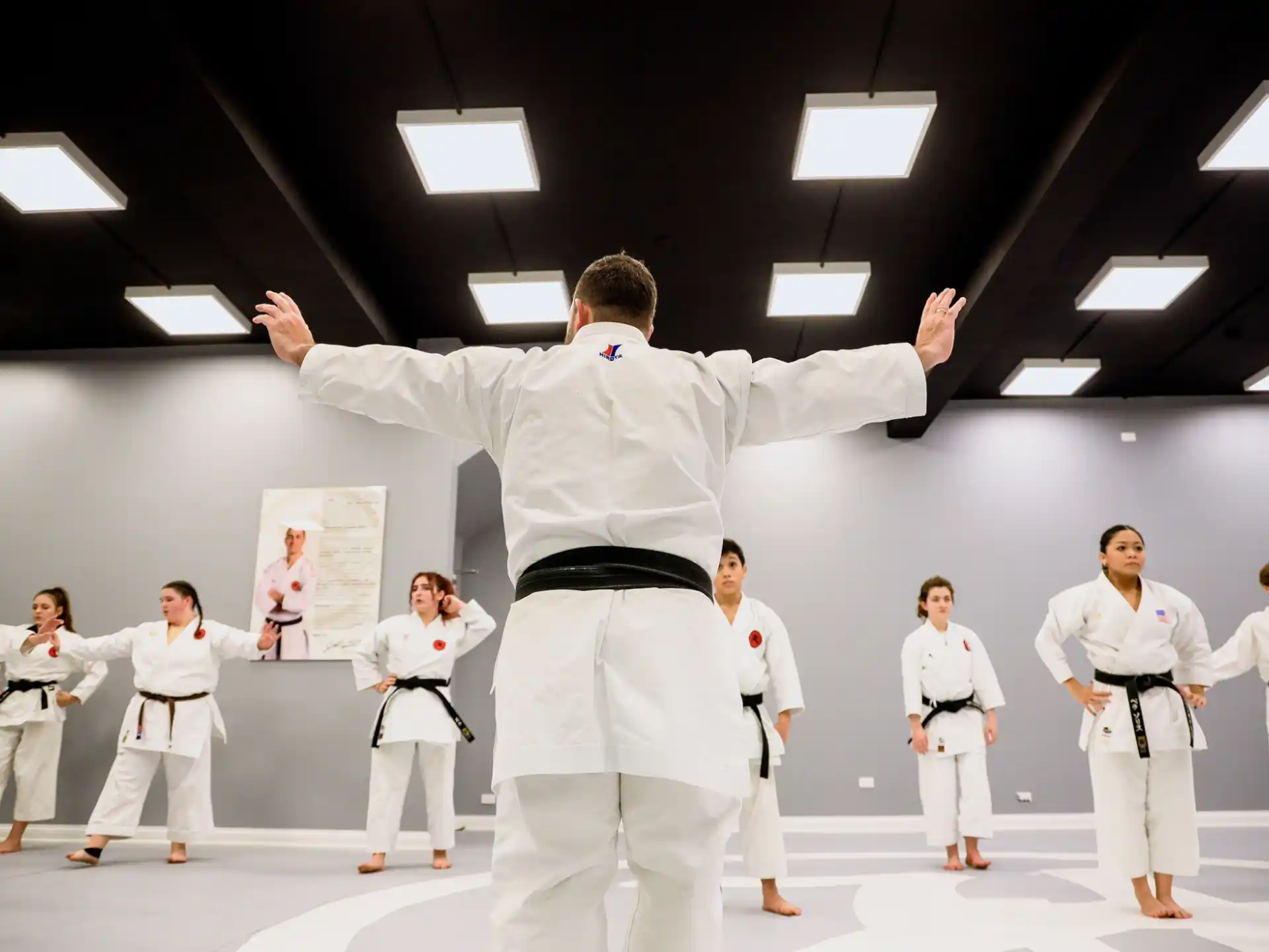 a man in a karate uniform