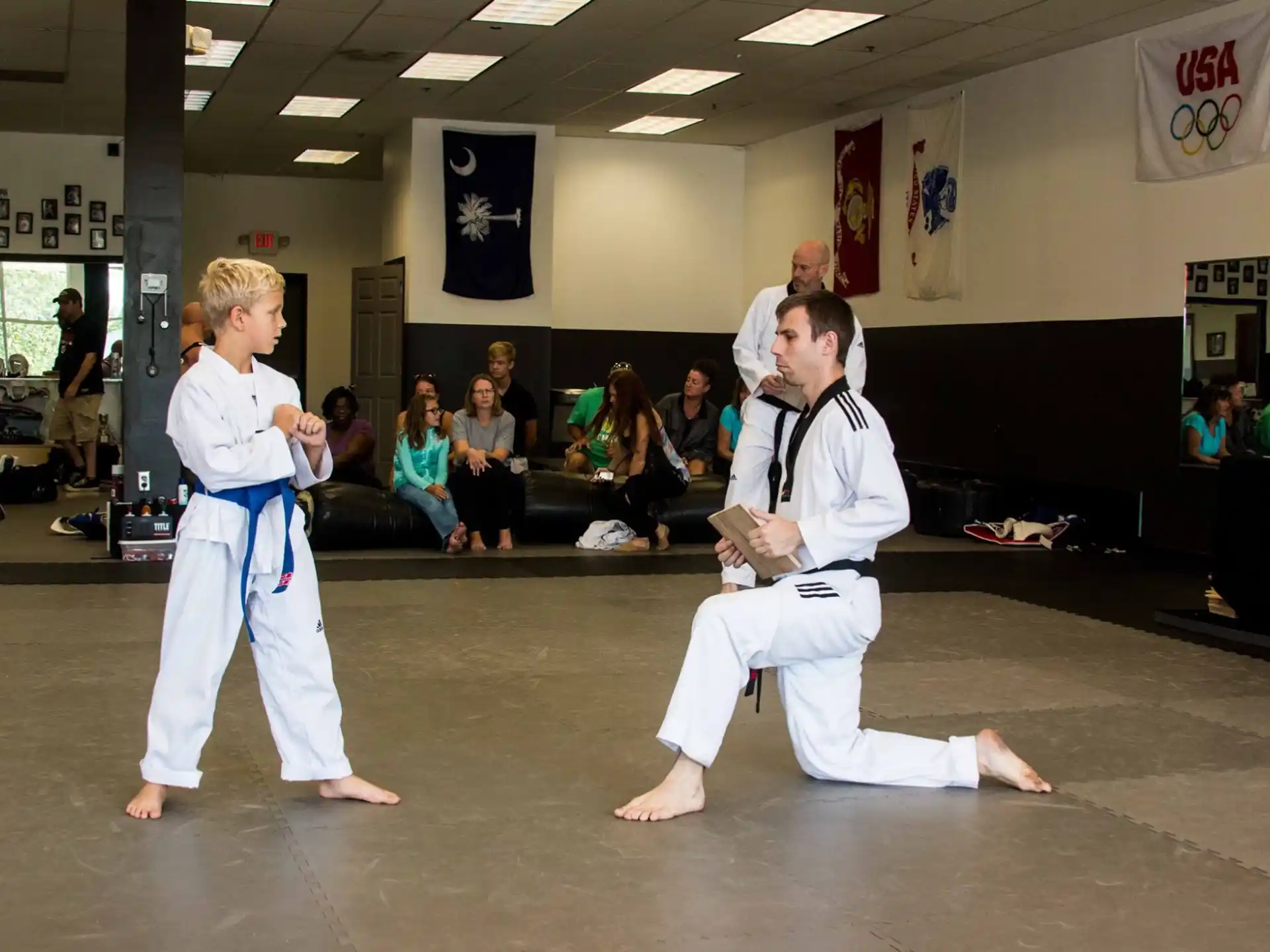 a couple of people in karate uniforms