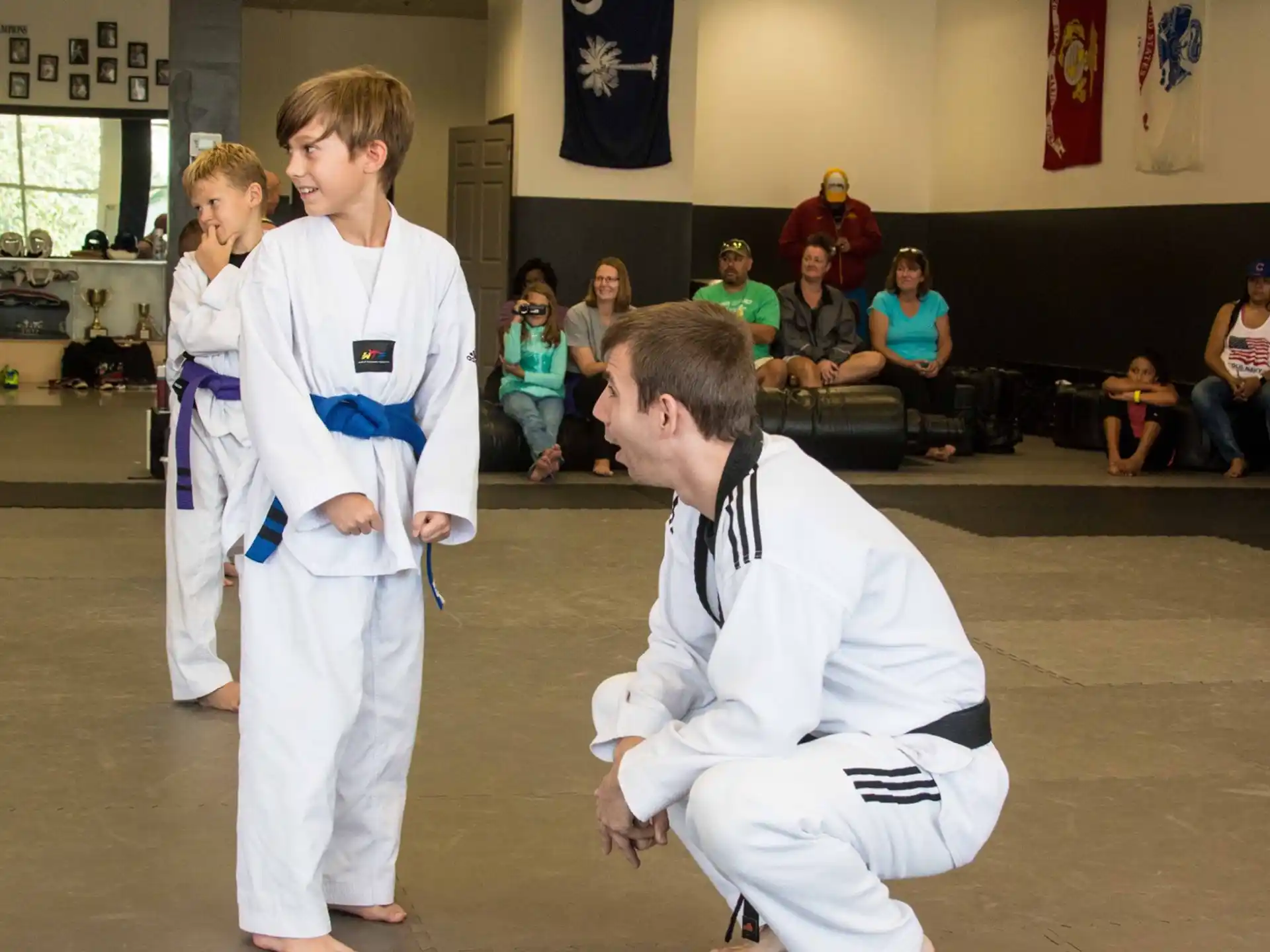 a group of people in karate uniforms