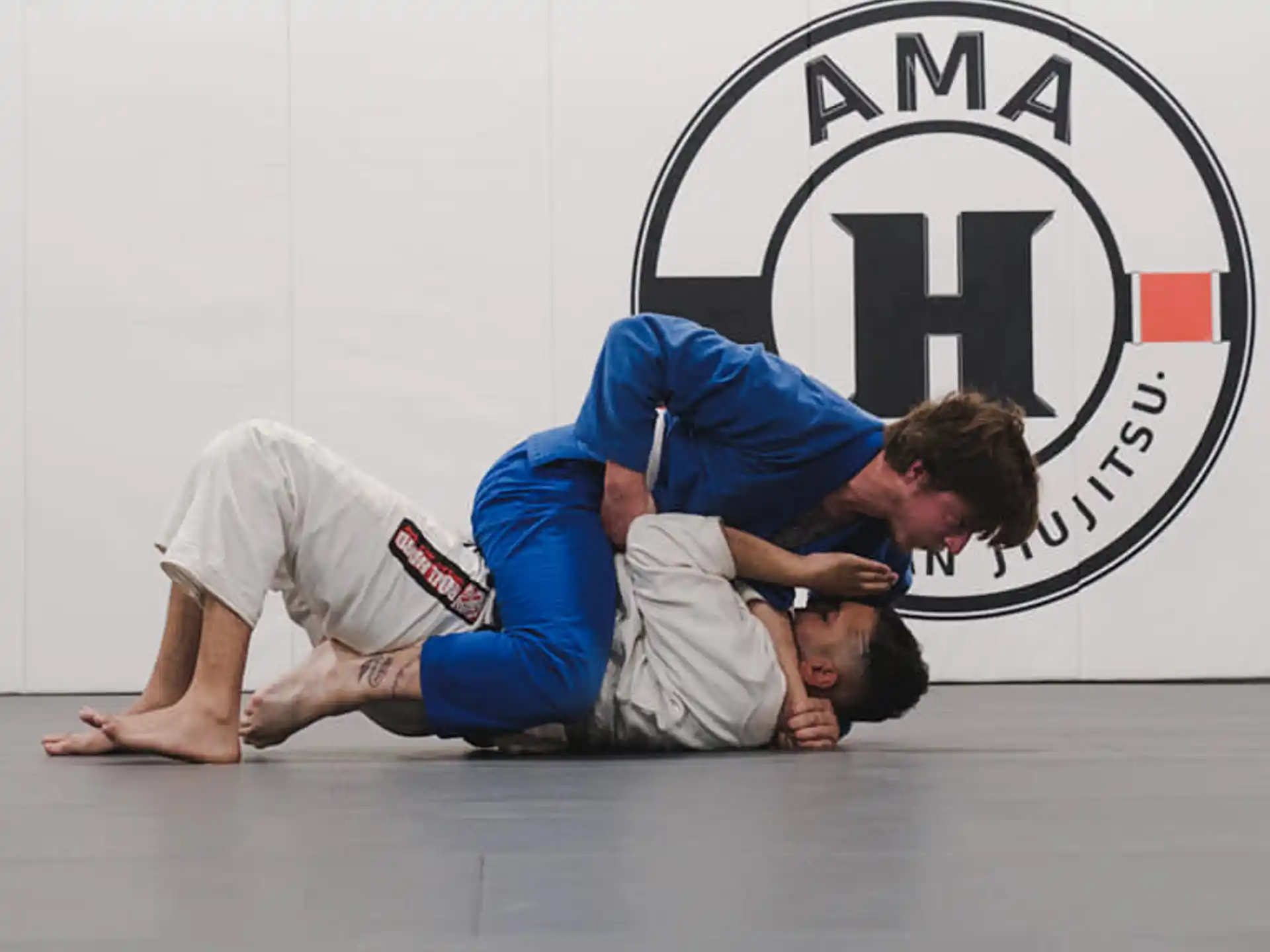 a man kicking another man
