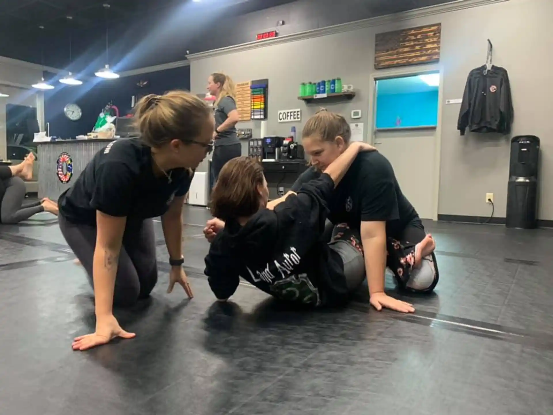 a group of people kneeling on the floor