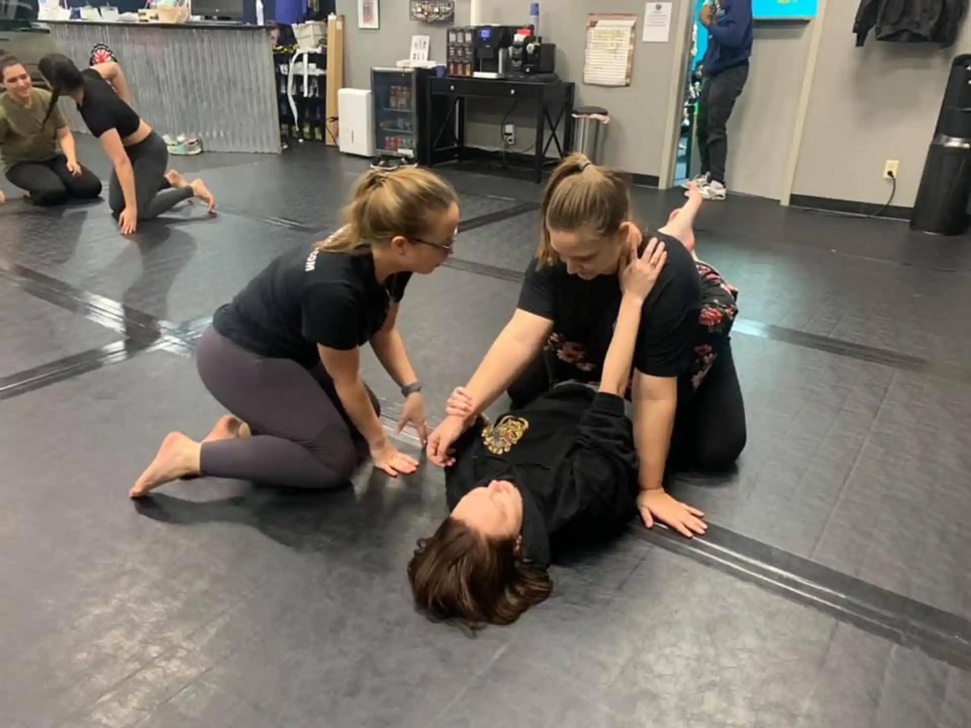 a group of people kneeling on the floor