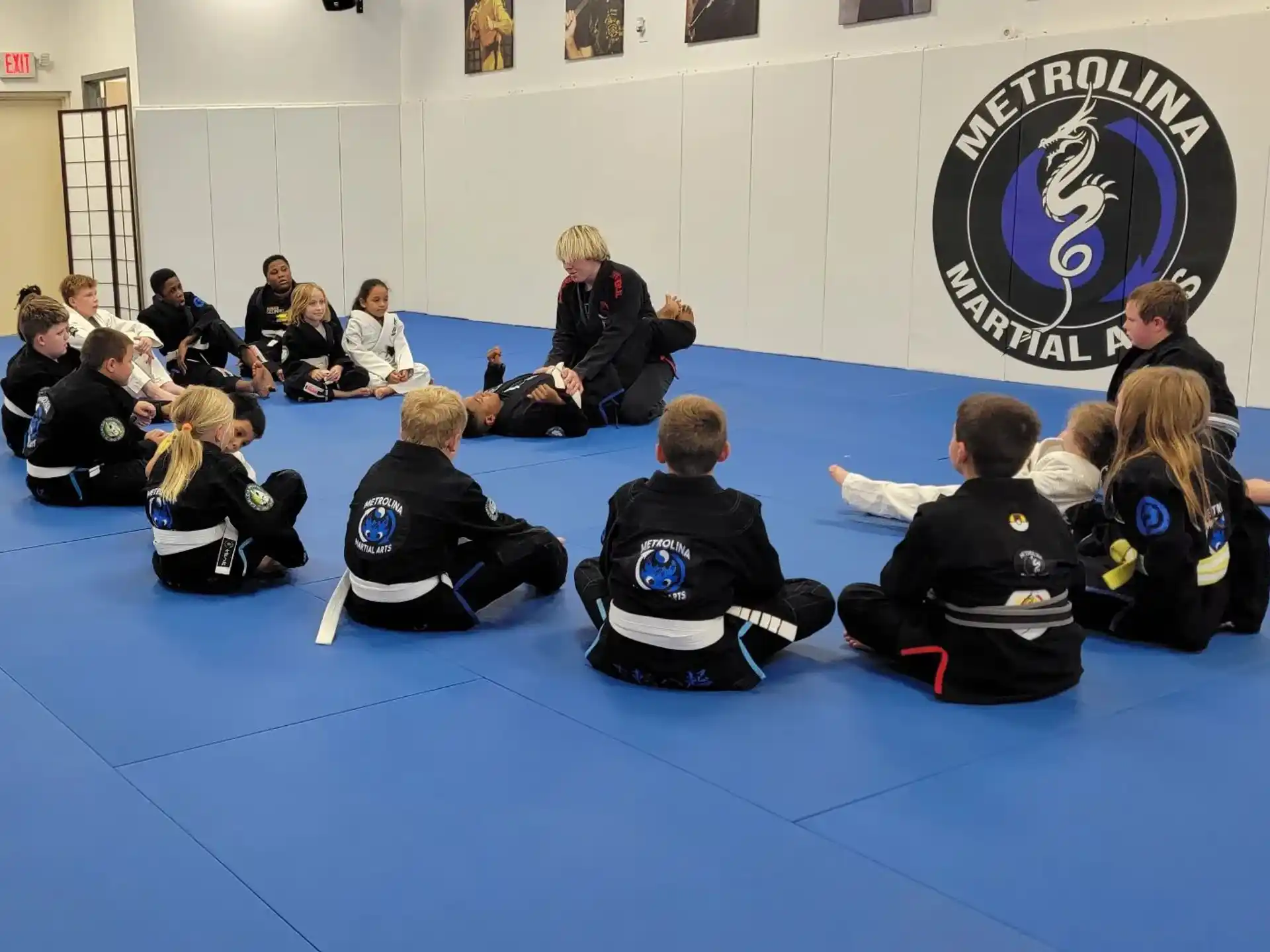 a group of people sitting on the floor