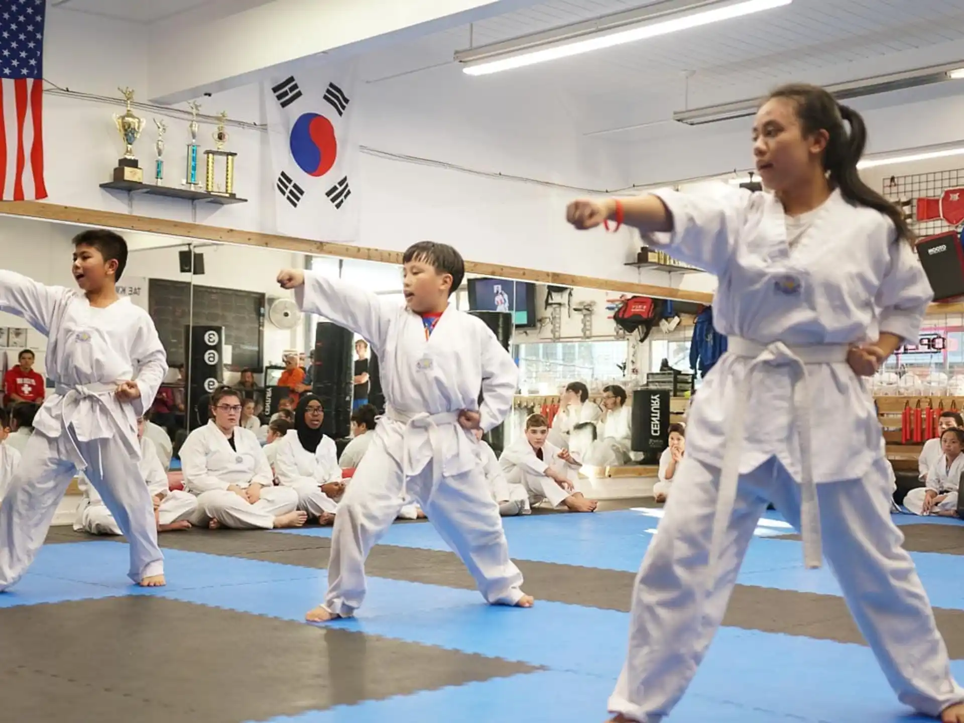 a group of people in karate uniforms