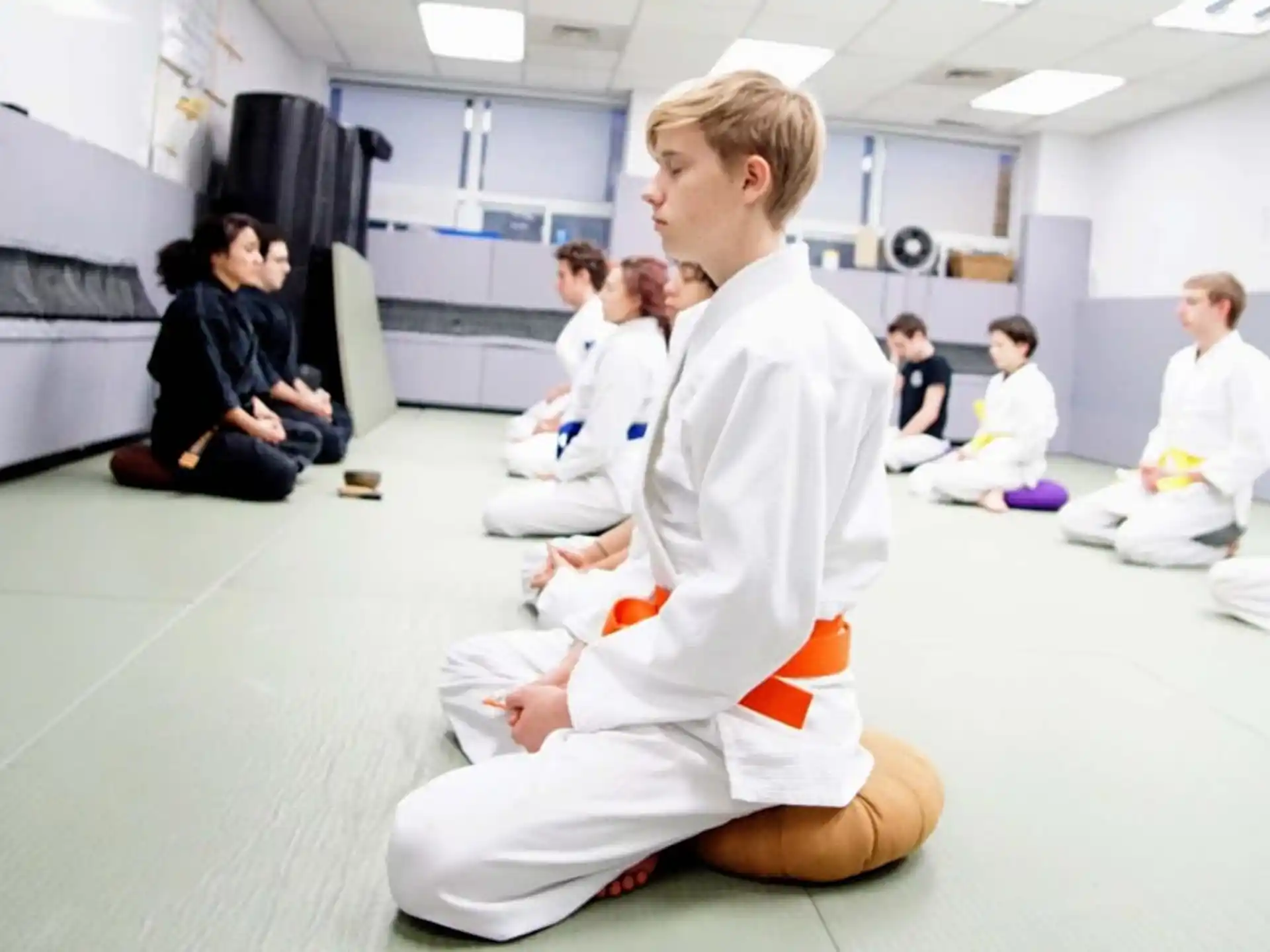 a group of people sitting in a room