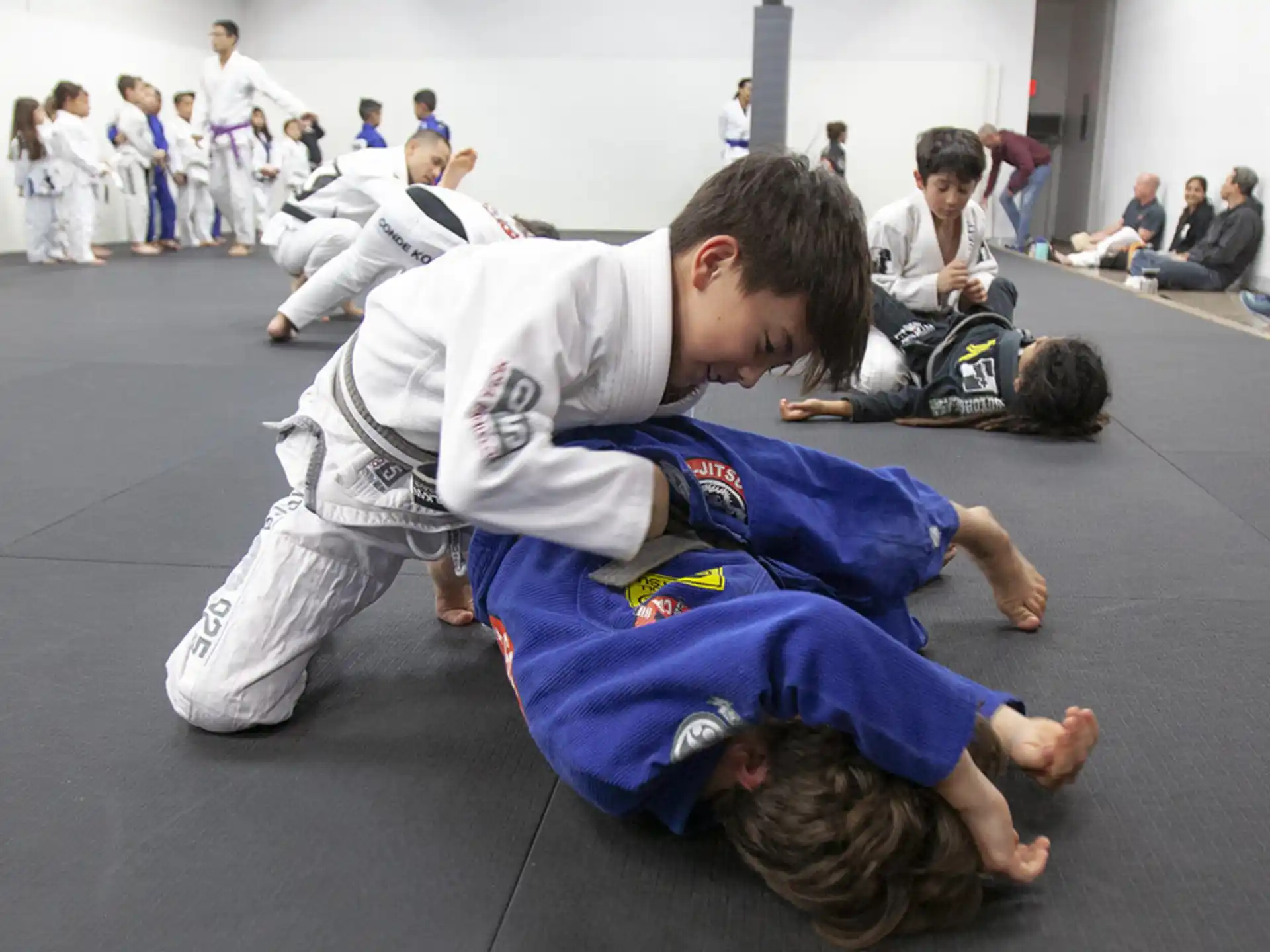 a group of people in karate uniforms