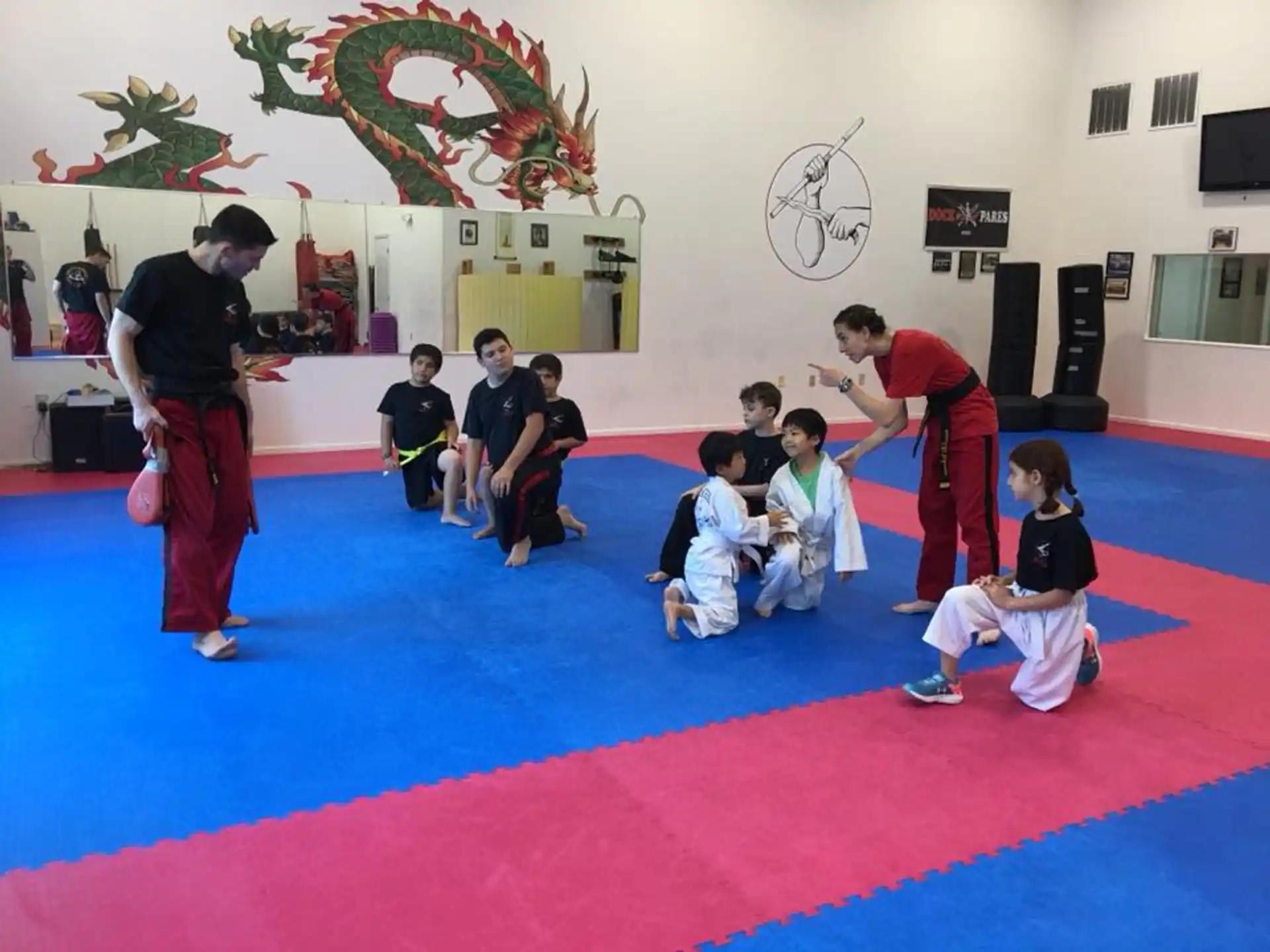 a group of people sitting on the floor