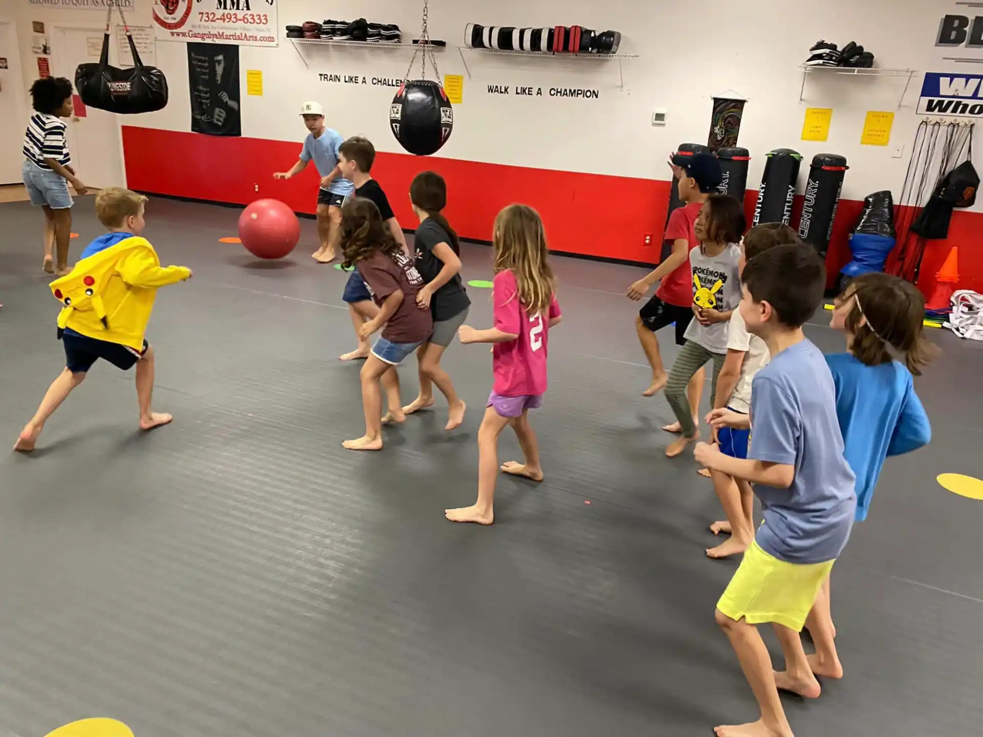 a group of children playing with balls