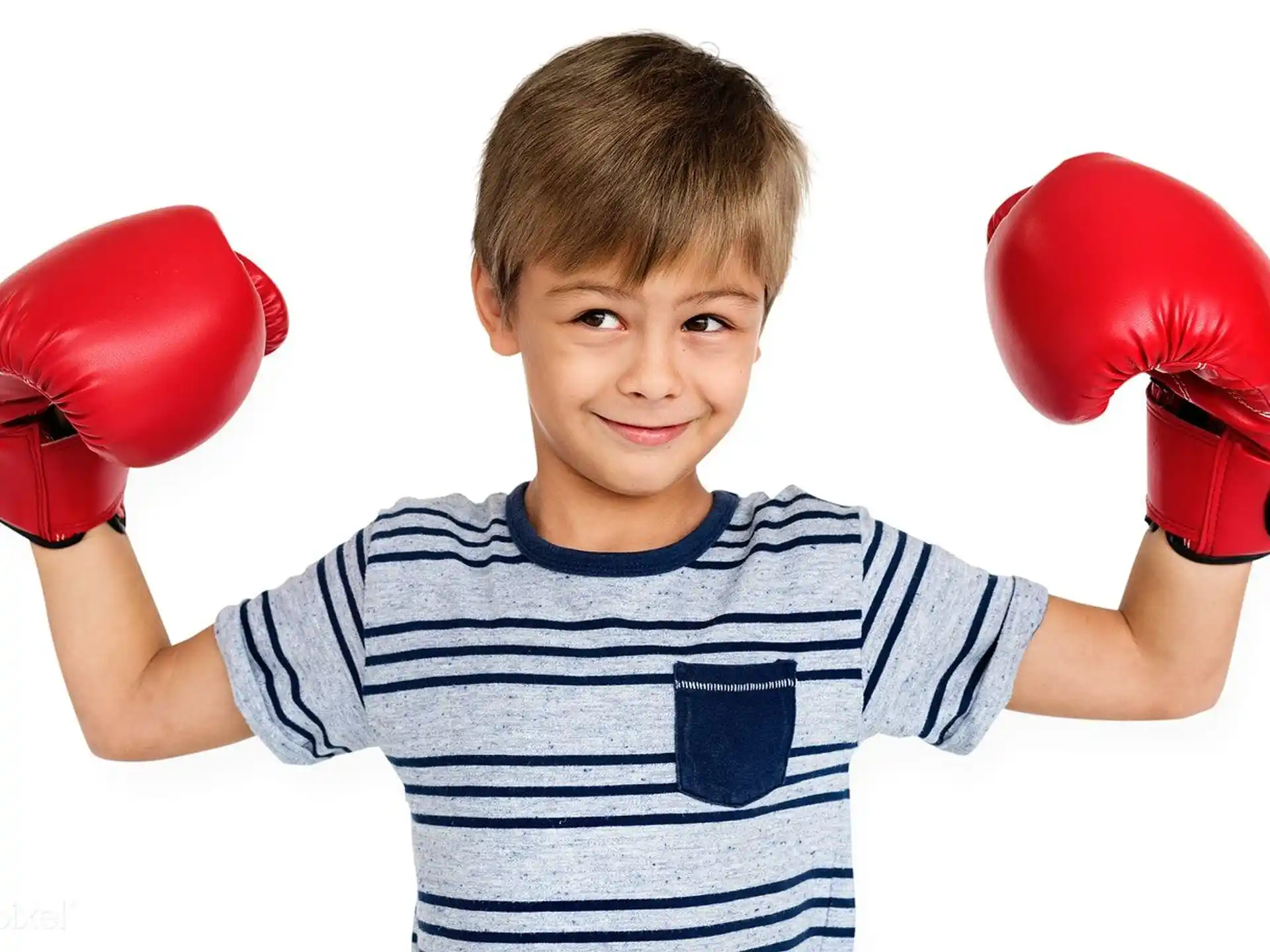 a boy with boxing gloves