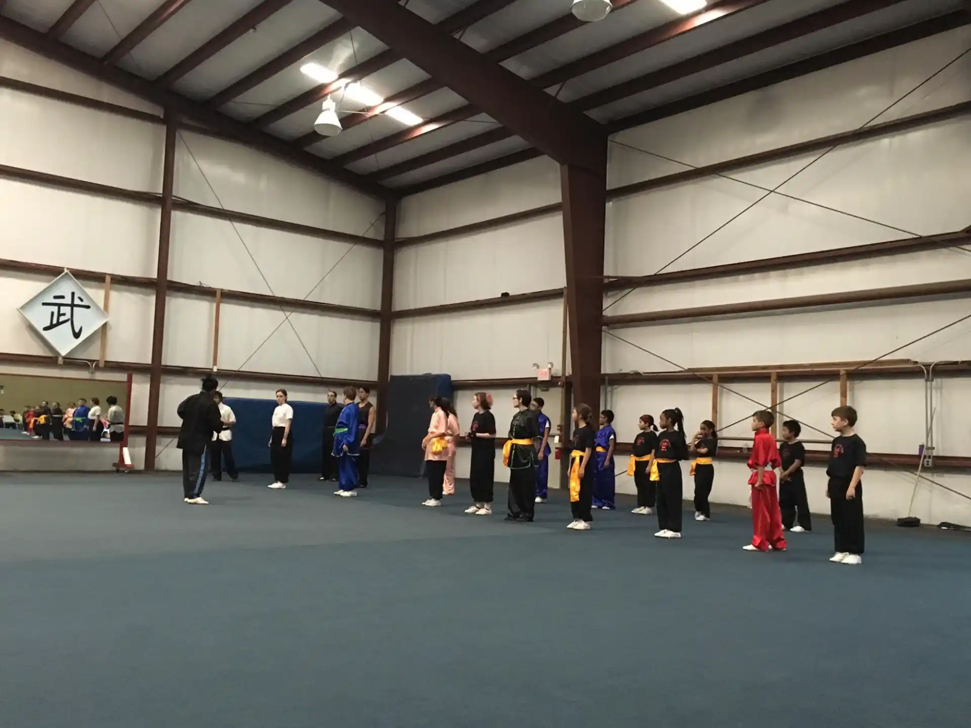 a group of people in a gym