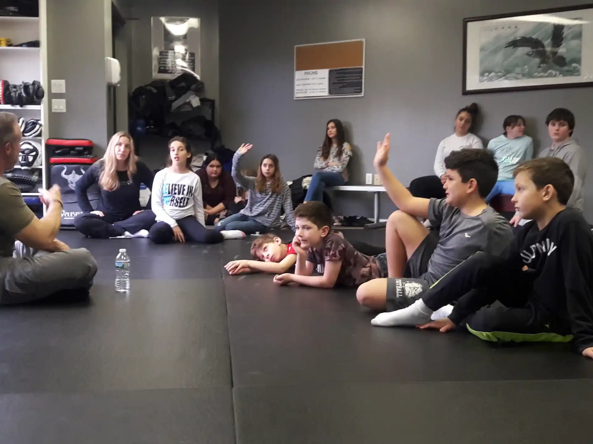 a group of people sitting on the floor