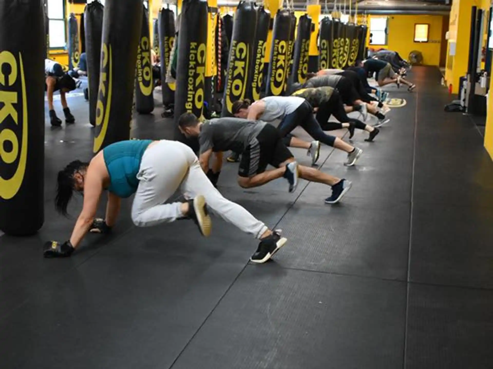 a group of people doing push ups