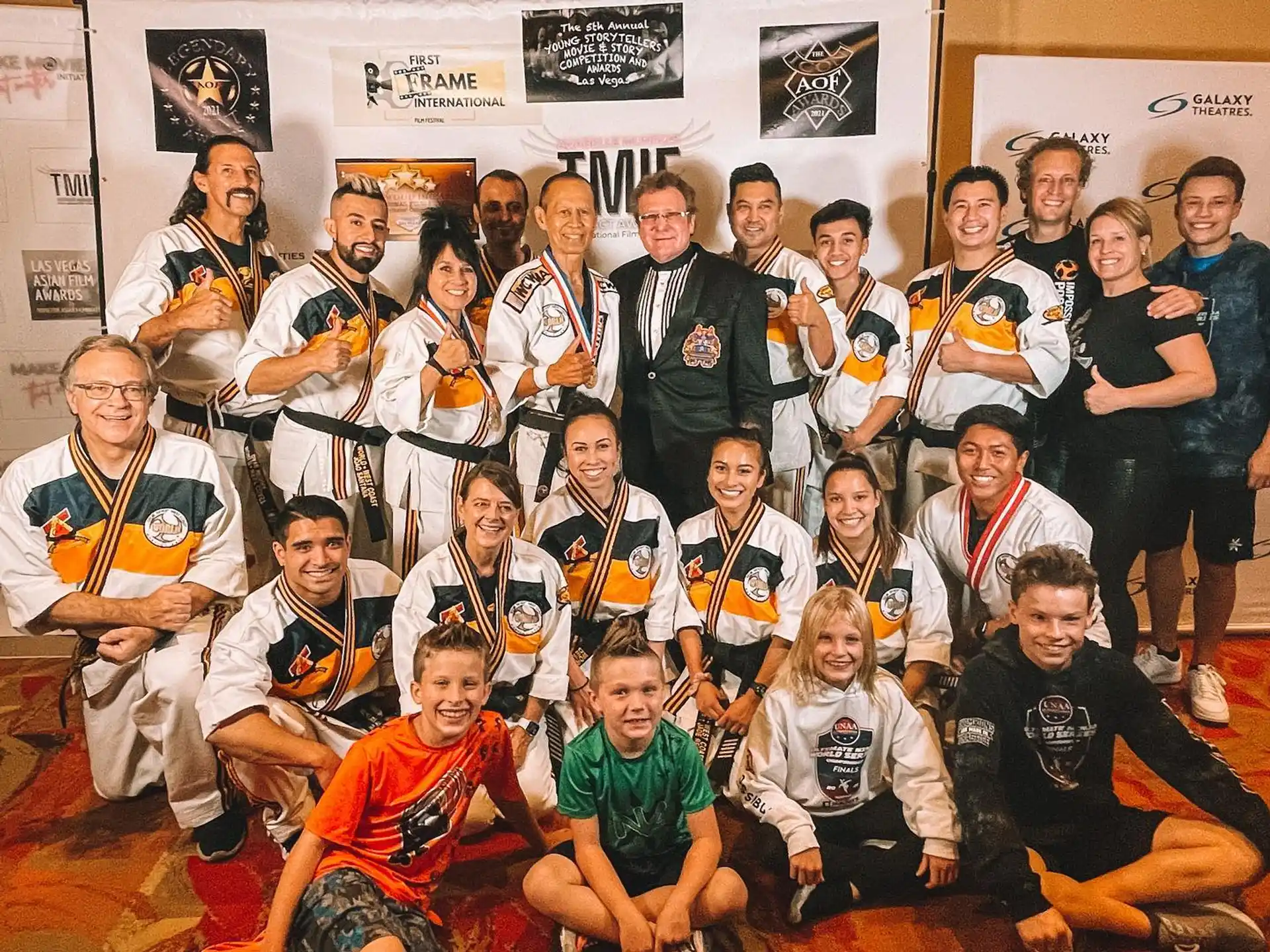 a group of people posing for a photo