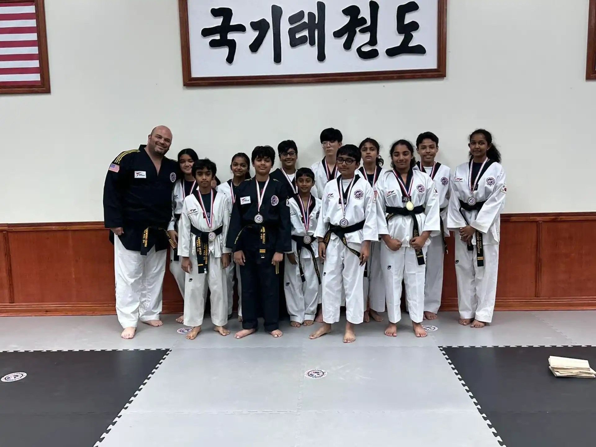 a group of people posing for a photo