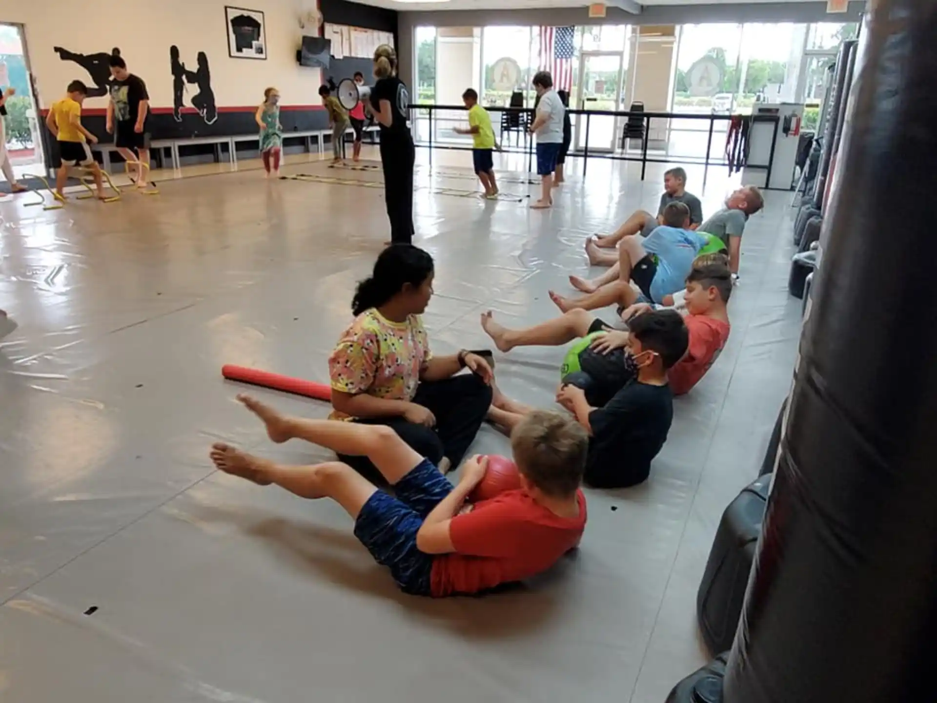 a group of children sitting on the floor