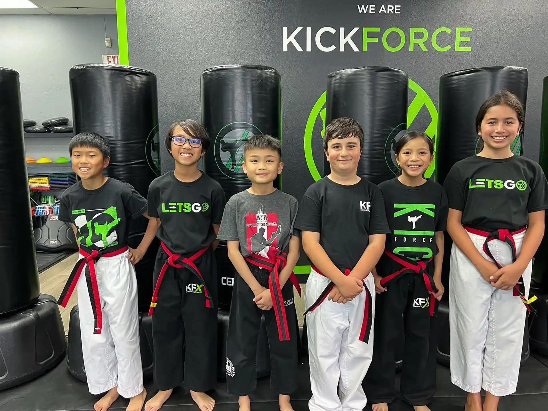 a group of kids posing for a photo