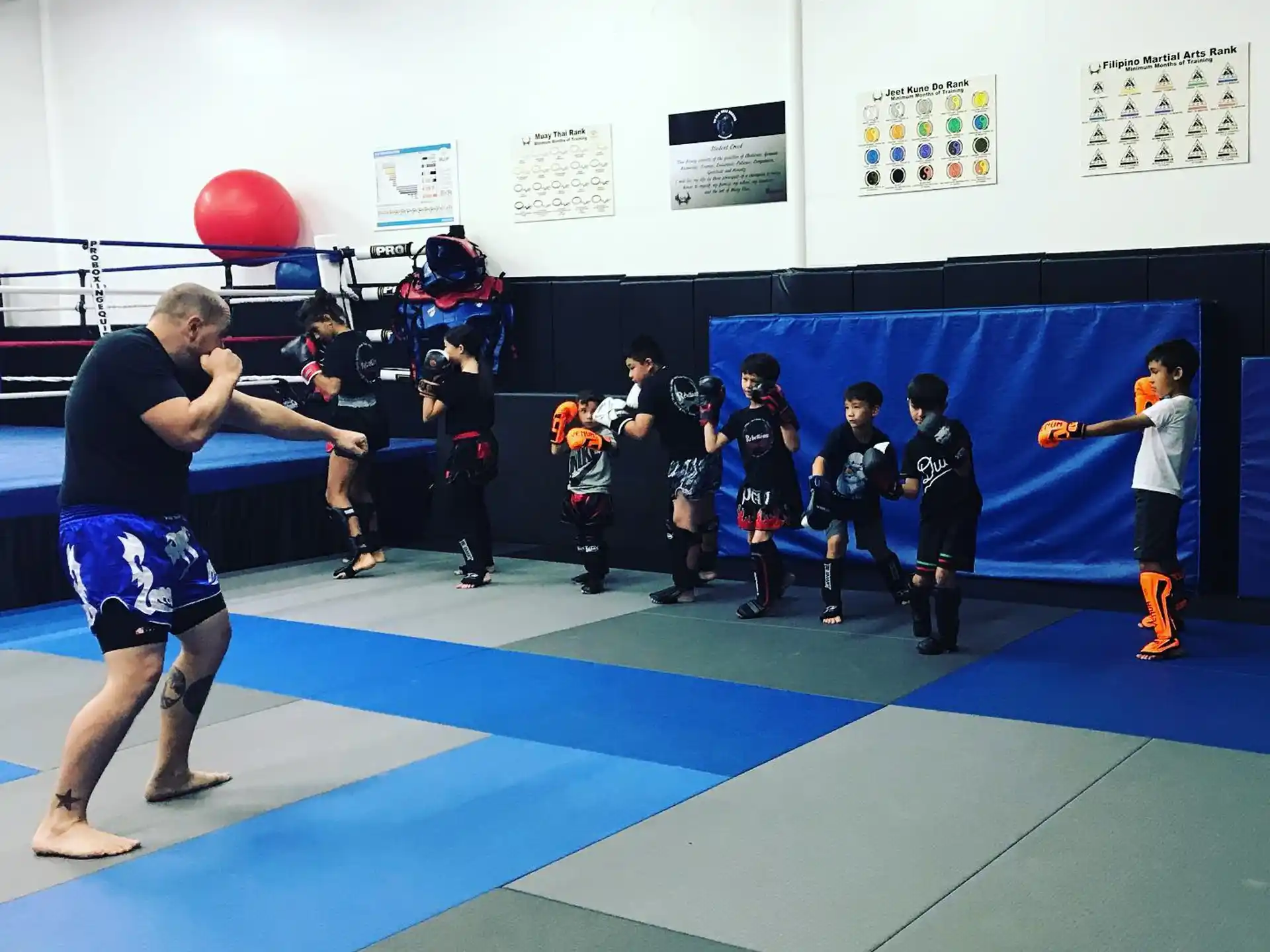 a group of people in a gym