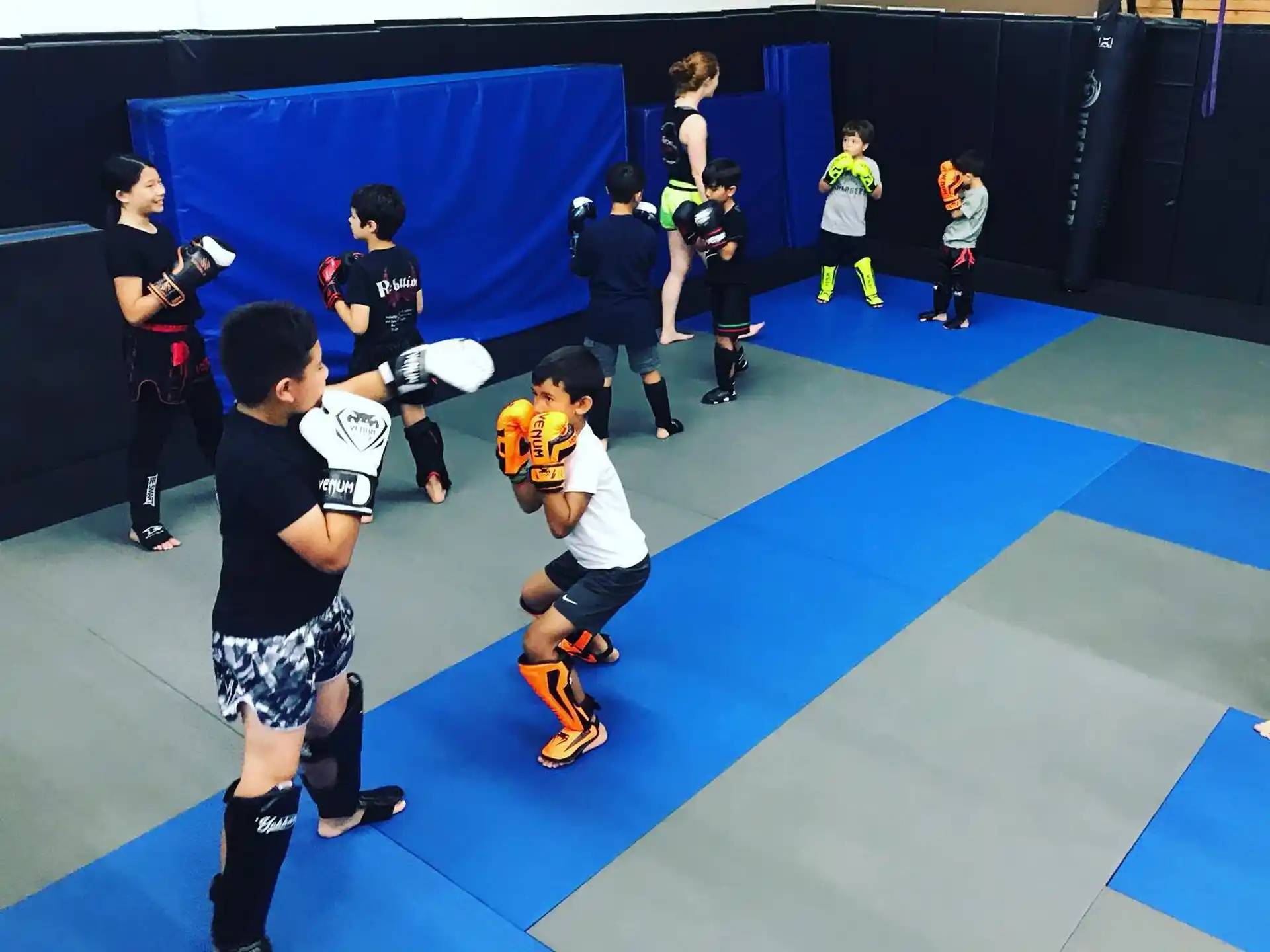 a group of people on a mat
