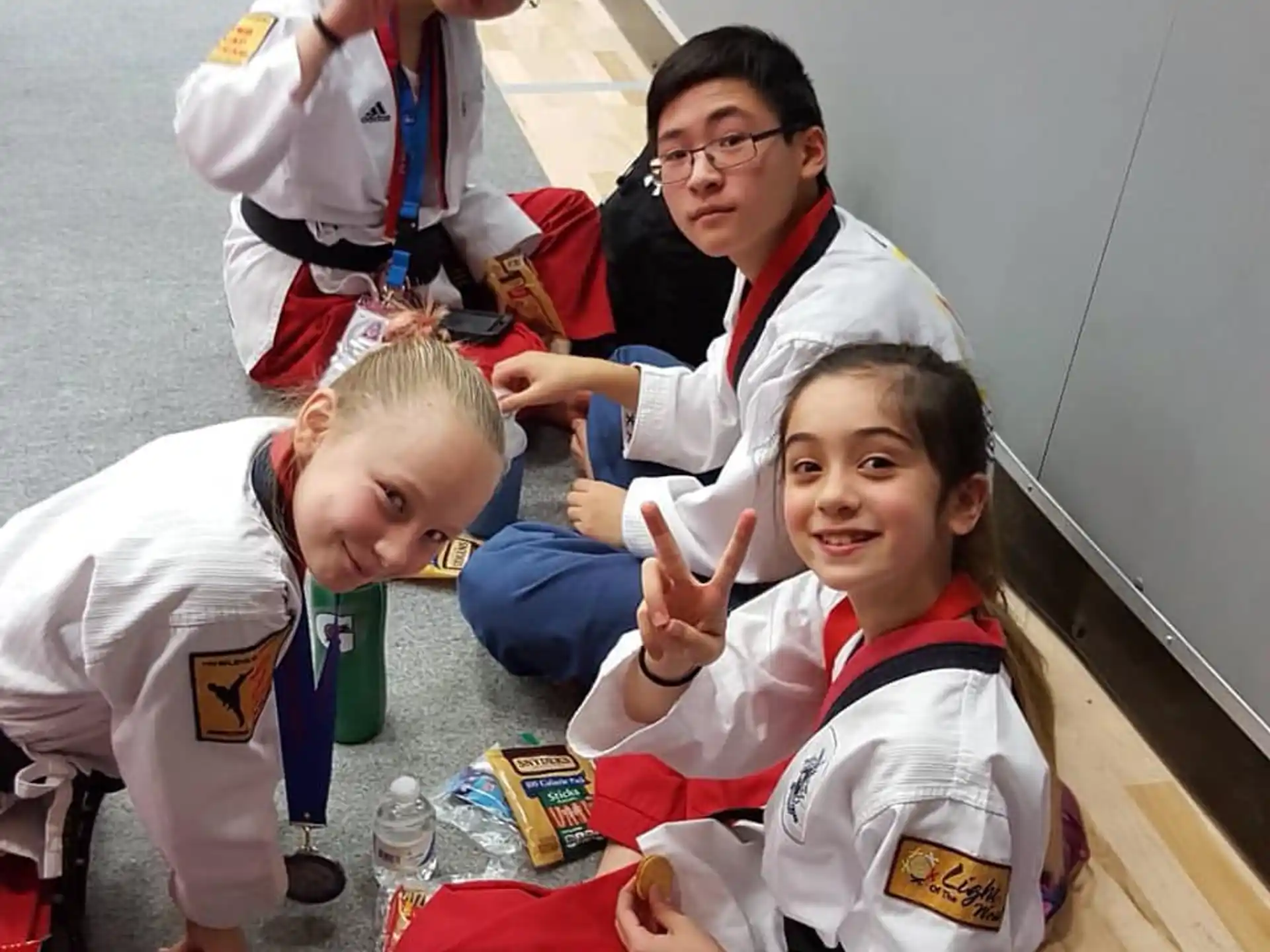 a group of people in white uniforms