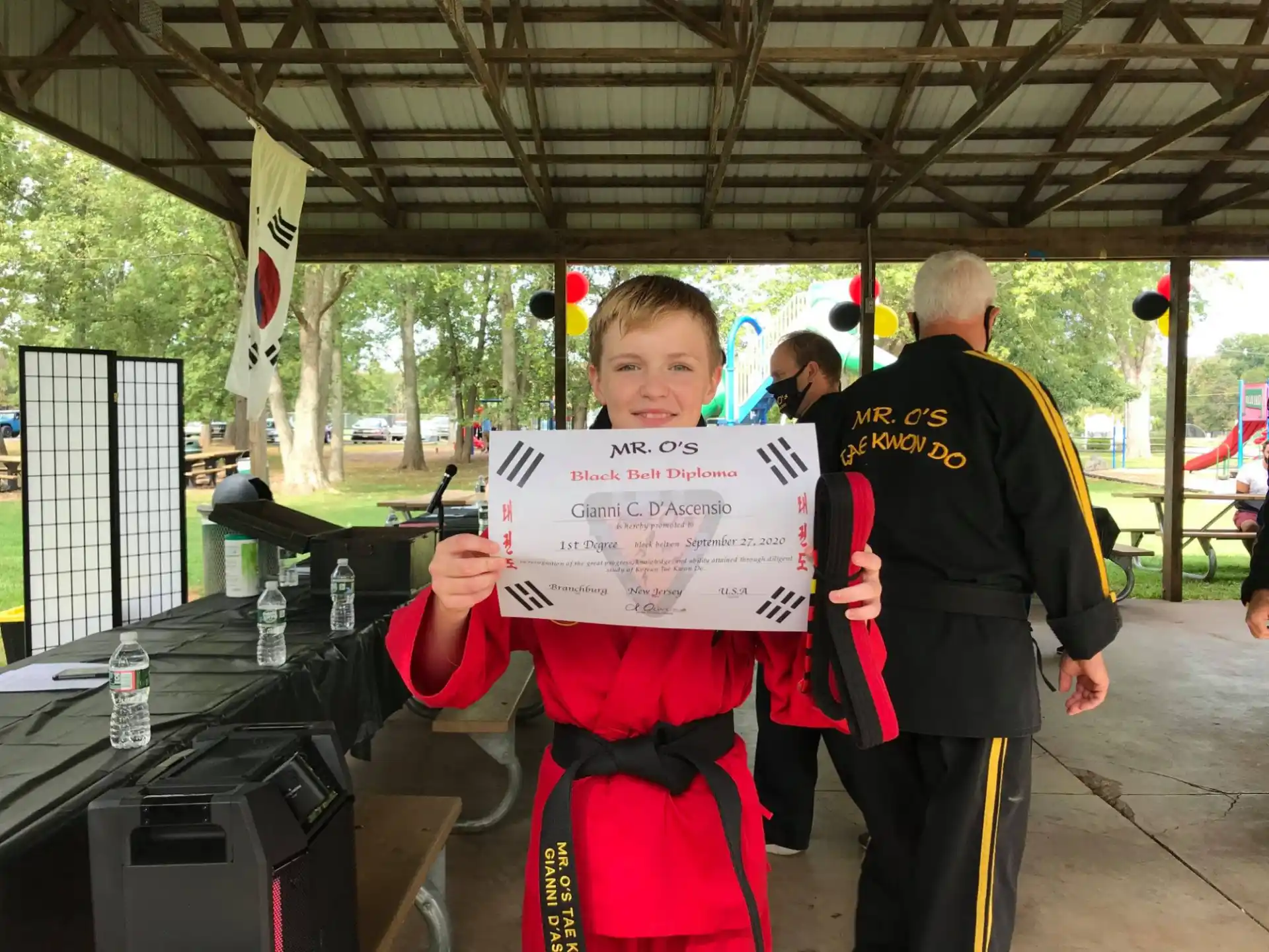 a boy holding a sign