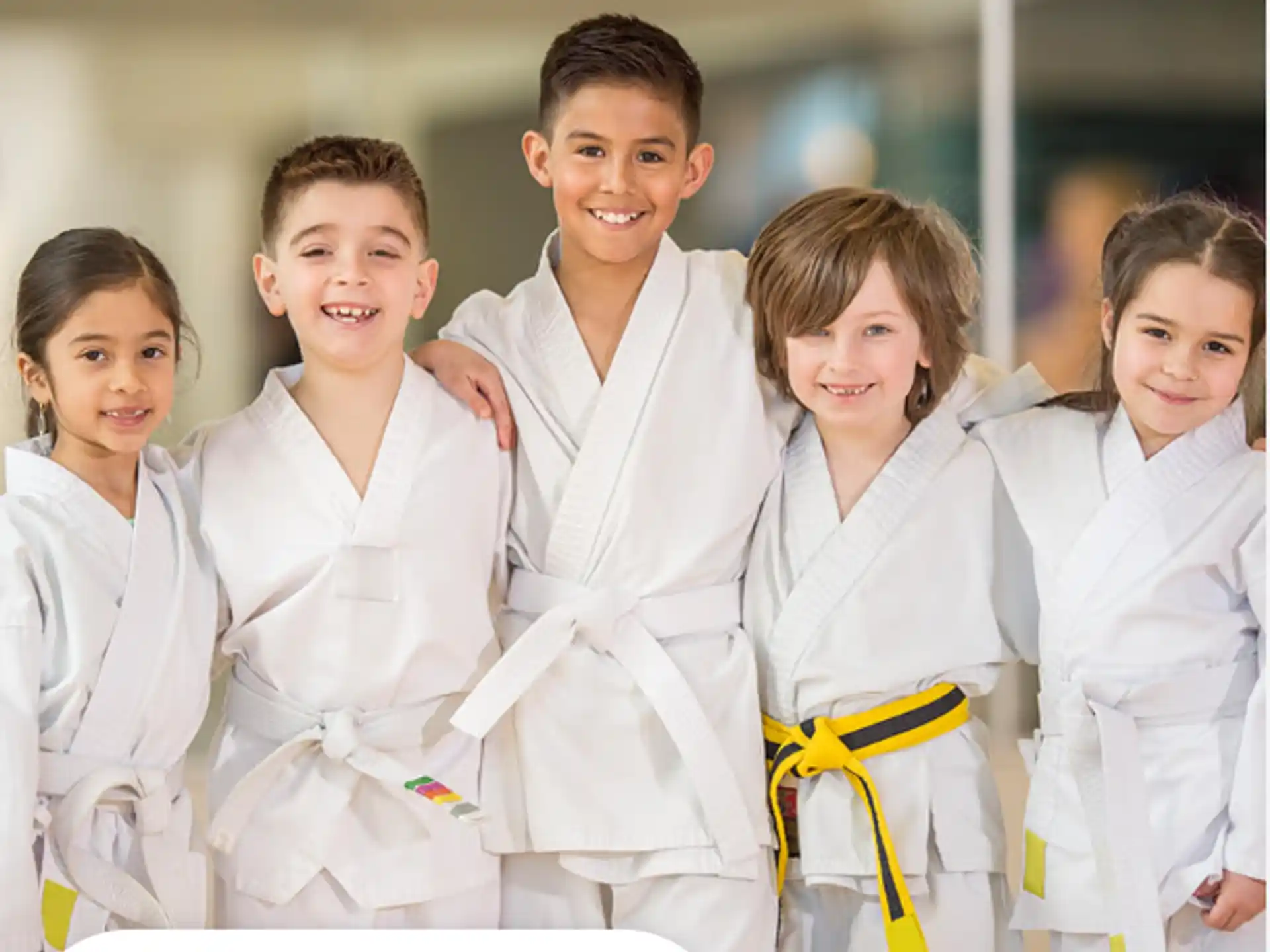 a group of children wearing white lab coats